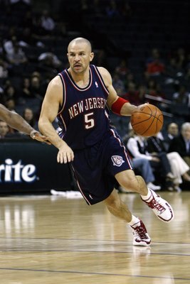 CHARLOTTE, NC - JANUARY 8: Jason Kidd #5 of the New Jersey Nets drives the ball up court during the game against the Charlotte Bobcats at Charlotte Bobcats Arena on January 8, 2008 in Charlotte, North Carolina.  Bobcats defeated Nets 115-99.  NOTE TO USER
