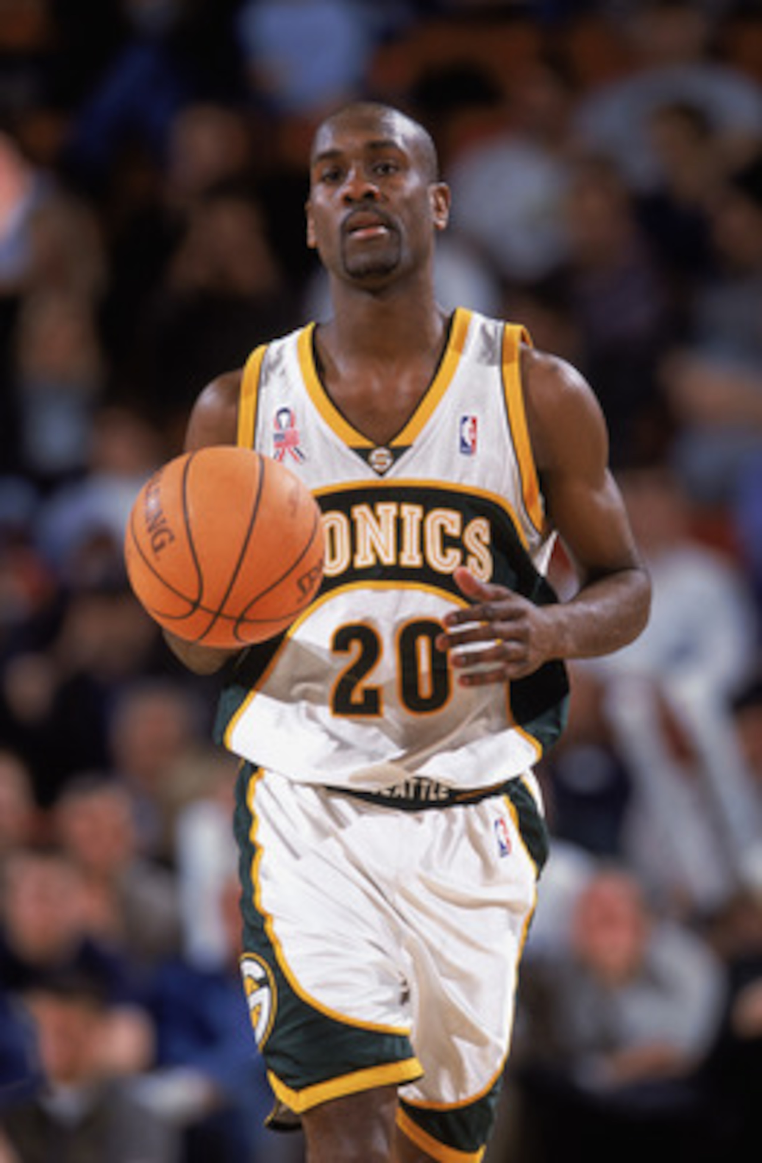 12 Feb 2002:  Point guard Gary Payton #20 of the Seattle SuperSonics dribbles the ball during the NBA game against the Dallas Mavericks at the Key Arena in Seattle, Washington. The Mavericks defeated the Sonics 112-106.  NOTE TO USER:  User expressly ackn