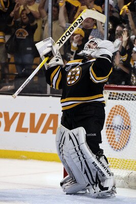 BOSTON, MA - JUNE 08: Tim Thomas #30 of the Boston Bruins celebrates after defeating the Vancouver Canucks in Game Four of the 2011 NHL Stanley Cup Final at TD Garden on June 8, 2011 in Boston, Massachusetts. The Boston Bruins defeated the Vancouver Canu BOSTON, MA - JUNE 08: Tim Thomas #30 of the Boston Bruins celebrates after defeating the Vancouver Canucks in Game Four of the 2011 NHL Stanley Cup Final at TD Garden on June 8, 2011 in Boston, Massachusetts. The Boston Bruins defeated the Vancouver Canu
