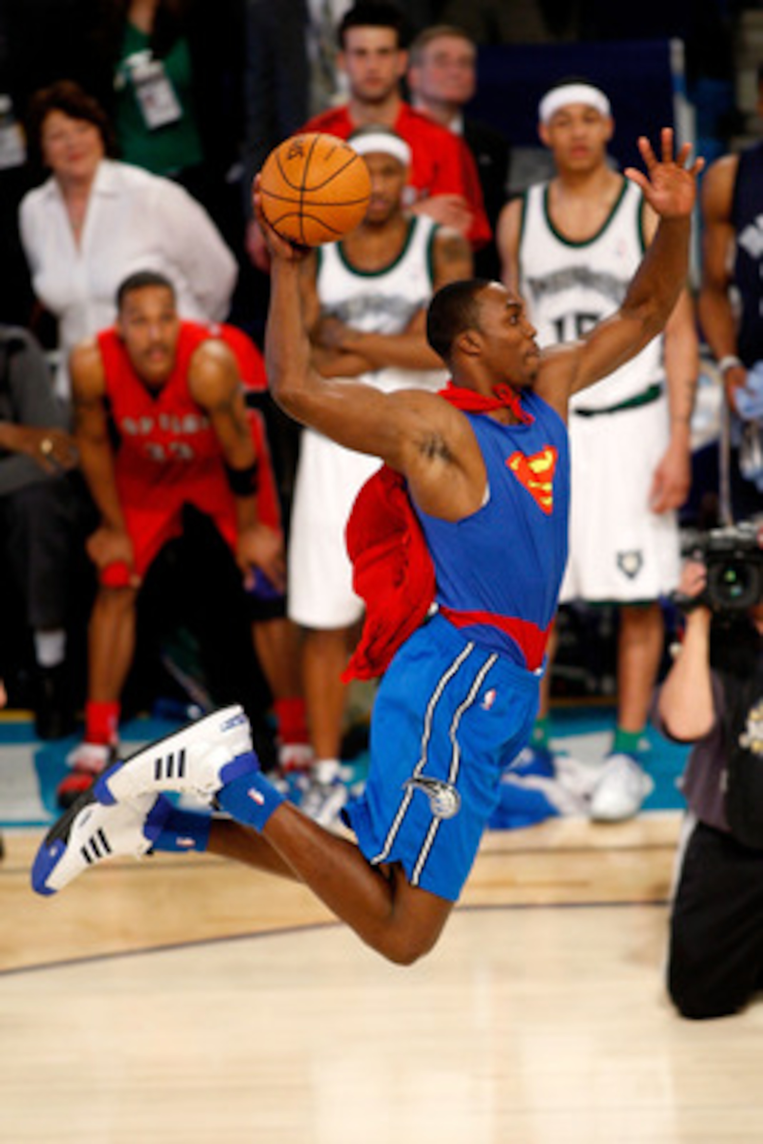NEW ORLEANS - FEBRUARY 16:  Dwight Howard of the Orlando Magic completes a dunk in the Sprite Slam Dunk Contest, part of 2008 NBA All-Star Weekend at the New Orleans Arena on February 16, 2008 in New Orleans, Louisiana.  NOTE TO USER: User expressly ackno