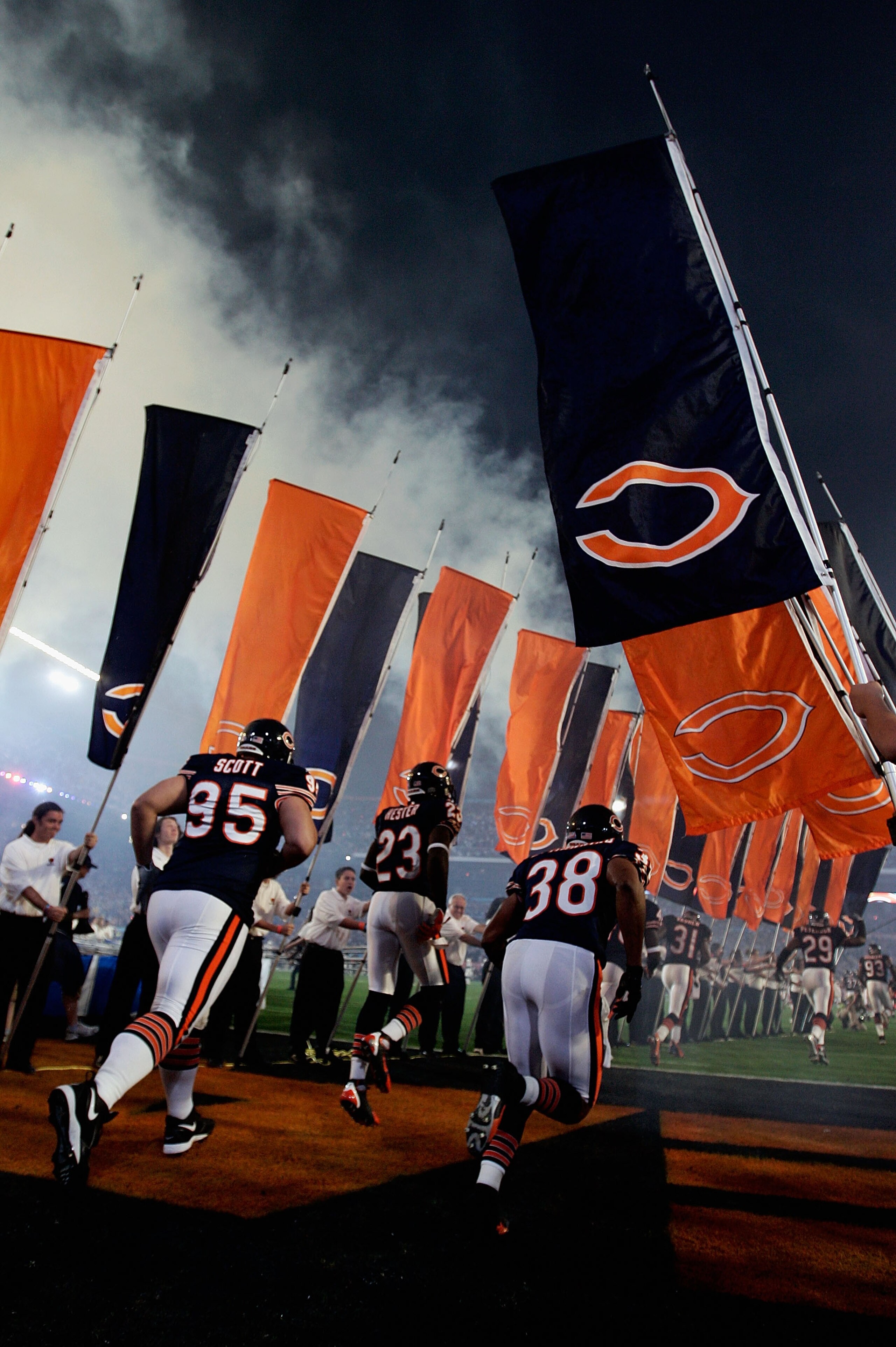 MIAMI GARDENS, FL - FEBRUARY 04:  Ian Scott #95, Devin Hester #23 and Danieal Manning #38 of the Chicago Bears take the field before playing in Super Bowl XLI against the Indianapolis Colts on February 4, 2007 at Dolphin Stadium in Miami Gardens, Florida.
