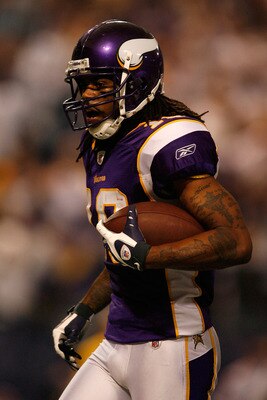 MINNEAPOLIS - JANUARY 17:  Wide receiver Sidney Rice #18 of the Minnesota Vikings scores a touchdown against the Dallas Cowboys during the fourth quarter of the NFC Divisional Playoff Game at Hubert H. Humphrey Metrodome on January 17, 2010 in Minneapolis