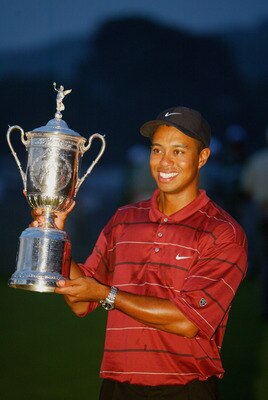 FARMINGDALE, NY - JUNE 16:  Tiger Woods poses with the trophy after winning the102nd US Open on the Black Course at Bethpage State Park in Farmingdale, New York on June 16, 2002.  (Photo By Jamie Squire/Getty Images)