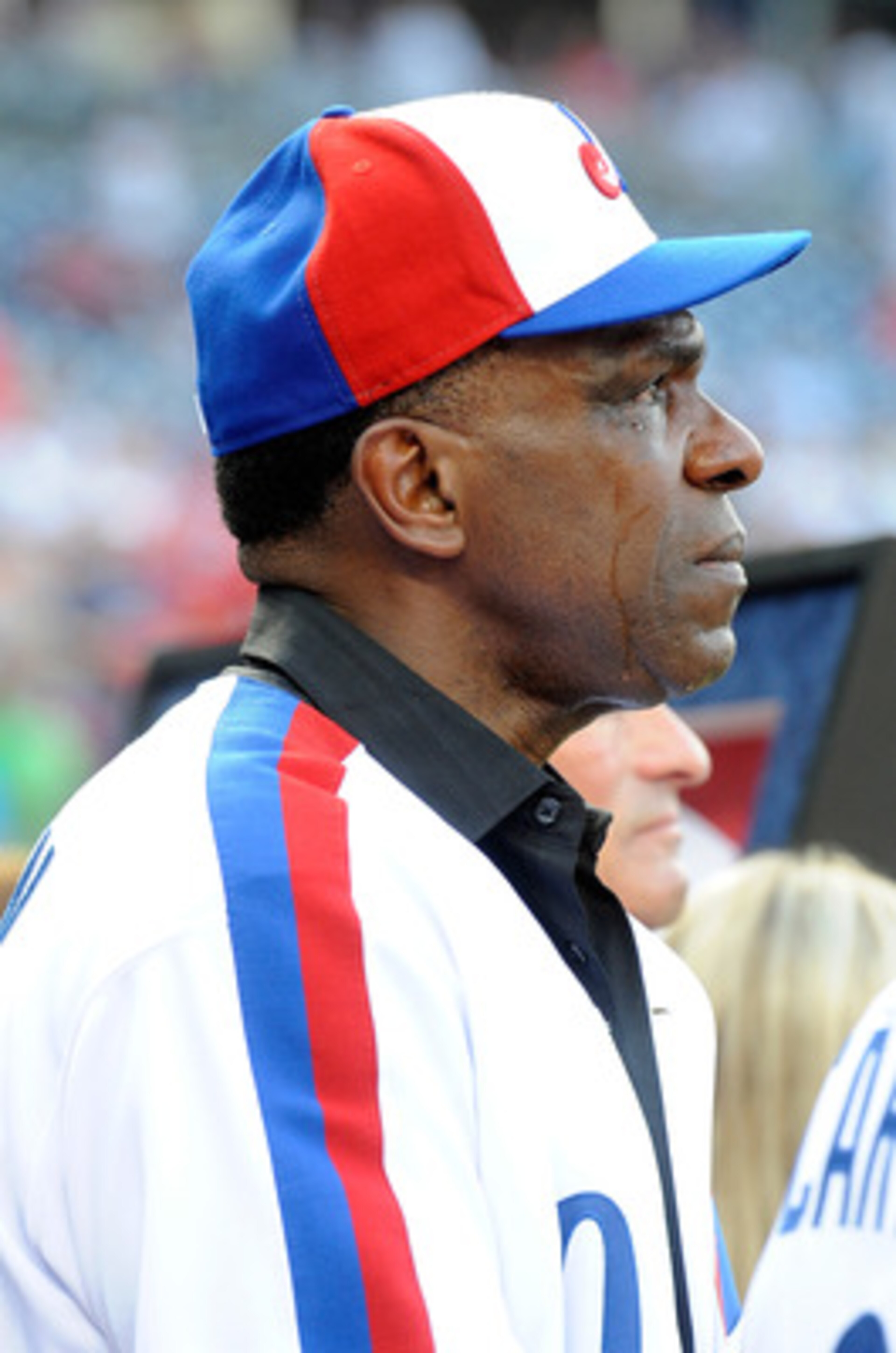 WASHINGTON - AUGUST 10:  Andre Dawson #10 gets emotional watching a video tribute before the game between the Washington Nationals and the Florida Marlins at Nationals Park on August 10, 2010 in Washington, DC.  (Photo by Greg Fiume/Getty Images)
