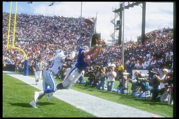 12 Sep 1993:  Tight end Marv Cook of the New England Patriots attempts to make a sideline catch during a game against the Detroit Lions at Foxboro Stadium in Foxboro, Massachusetts.  The Lions won the game in overtime, 19-16. Mandatory Credit: Rick Stewar