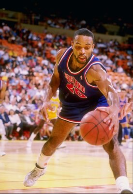 1989-1990:  Forward Winston Bennett of the Cleveland Cavaliers moves the ball during a game.