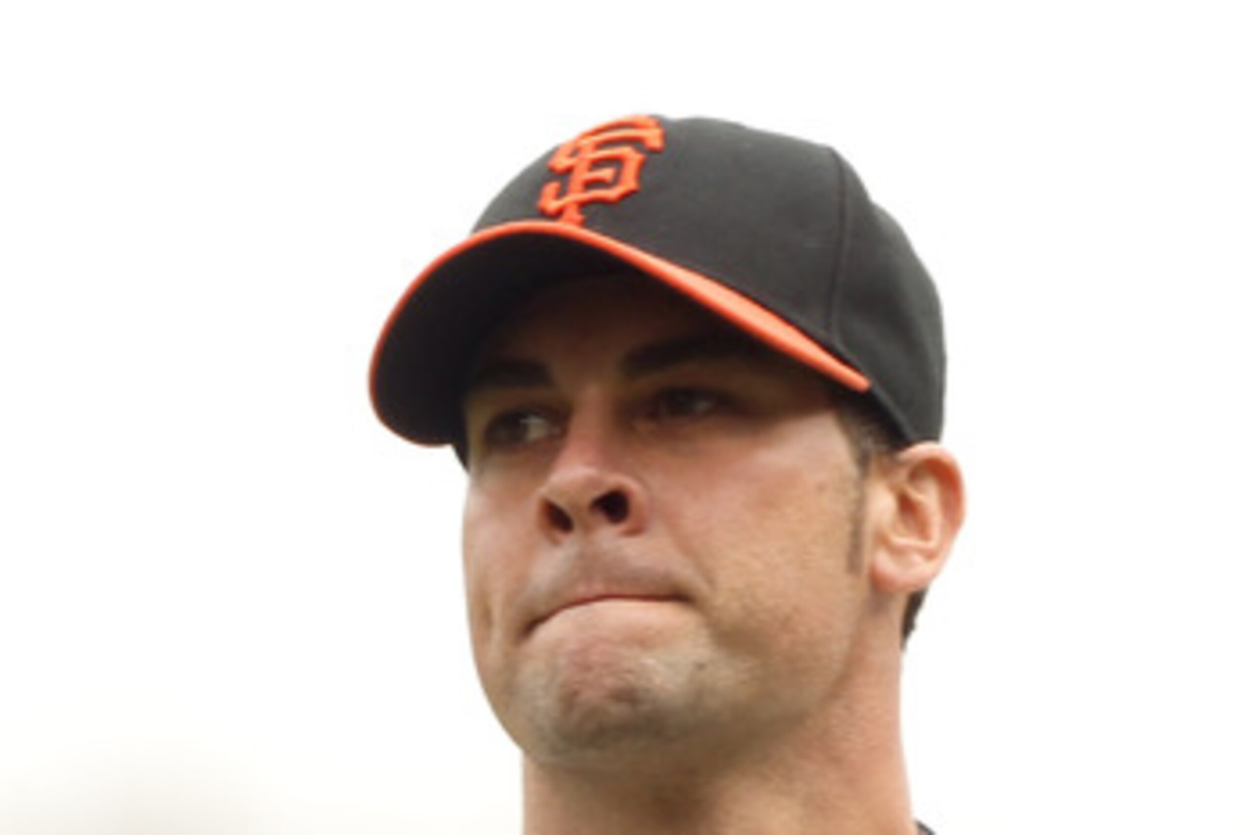 SAN FRANCISCO, CA - JUNE 05:  Ryan Vogelsong #32 of the San Francisco Giants reacts after giving up a home run to Chris Iannetta #20 of the Colorado Rockies at AT&T Park on June 5, 2011 in San Francisco, California.  (Photo by Ezra Shaw/Getty Images)