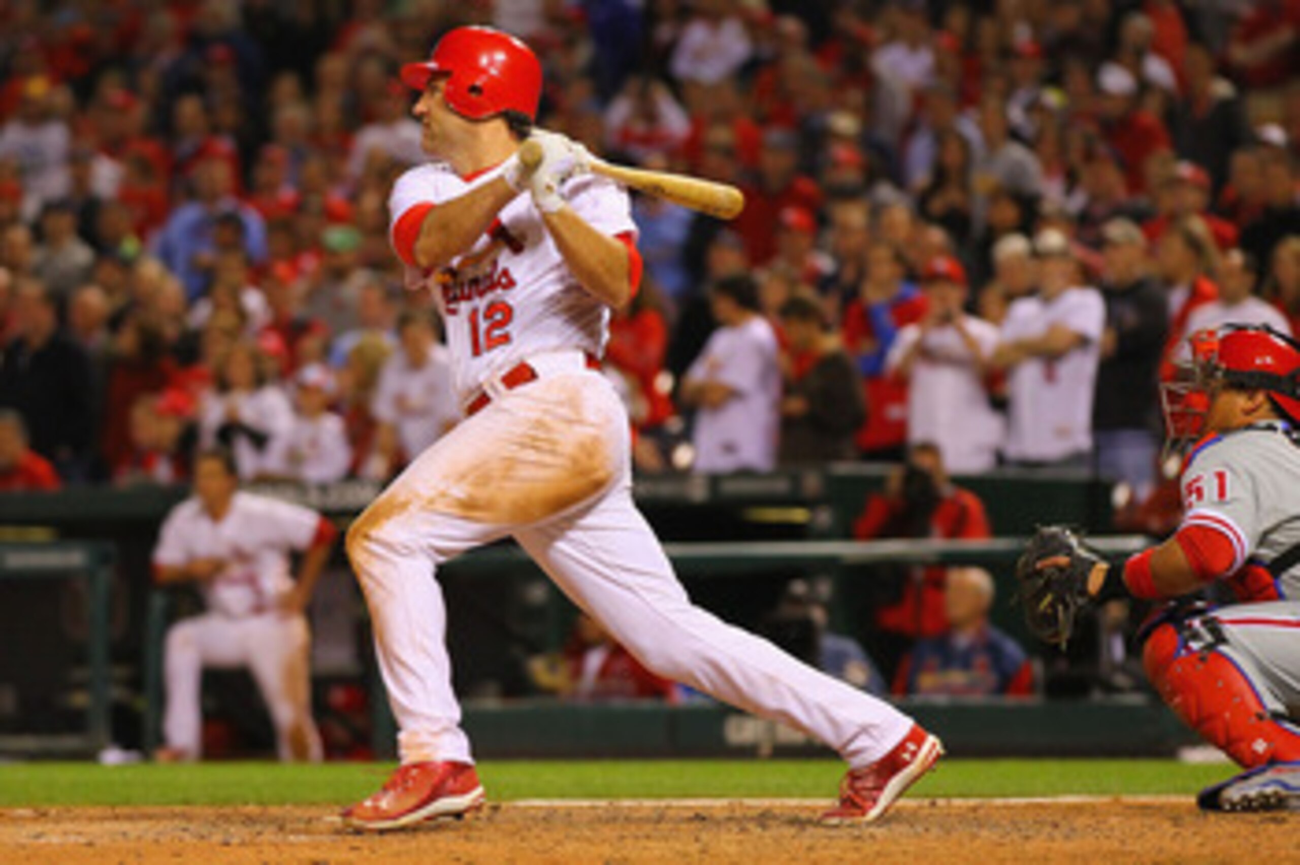ST. LOUIS, MO - MAY 17: Lance Berkman #12 of the of the St. Louis Cardinals hits a walk-off single against the Philadelphia Phillies Busch Stadium on May 17, 2011 in St. Louis, Missouri.  (Photo by Dilip Vishwanat/Getty Images)
