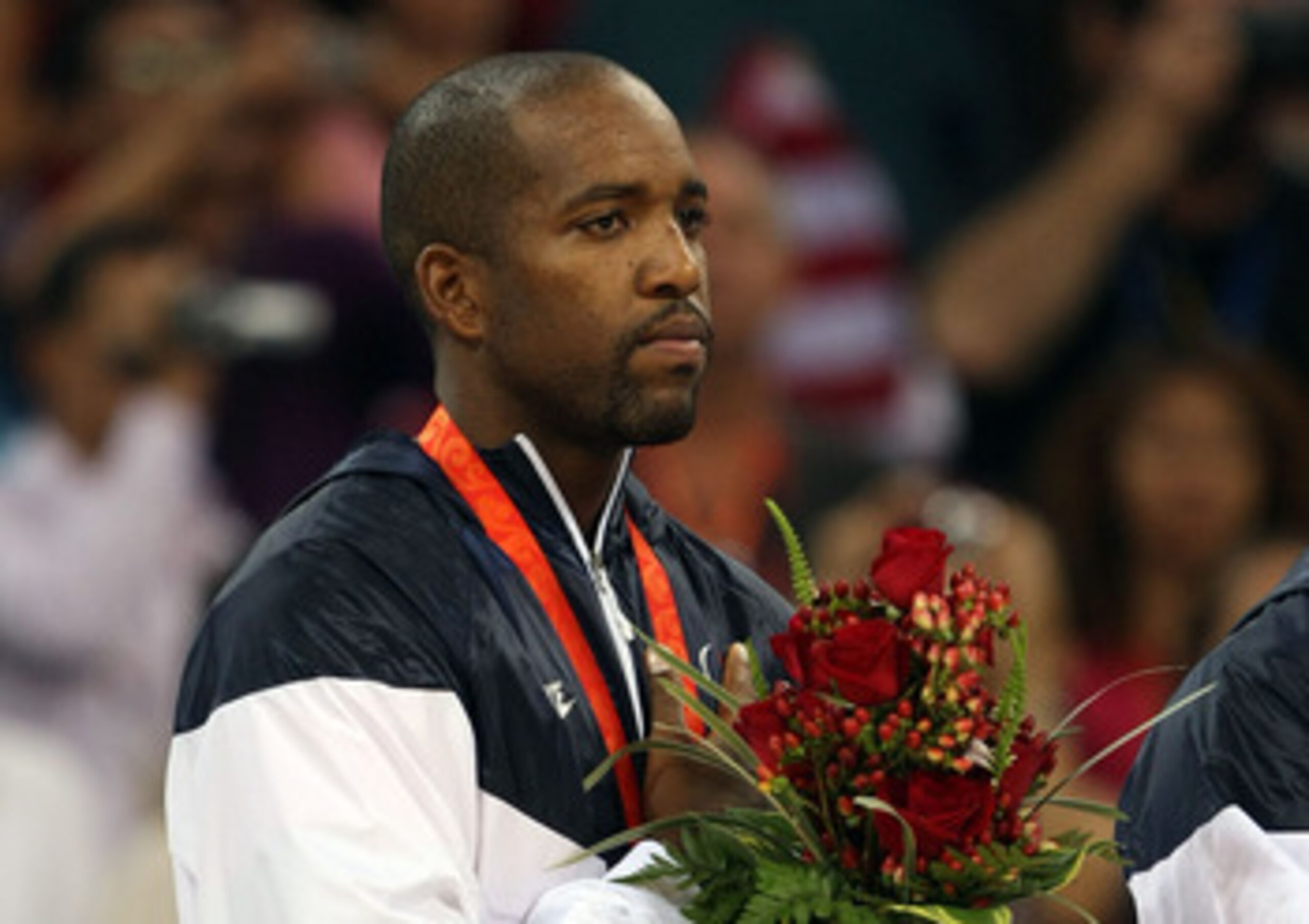 BEIJING - AUGUST 24:  Michael Redd #8 of the United States stands on the podium after winning the gold medal over Spain in the men's basketball final during Day 16 of the Beijing 2008 Olympic Games at the Beijing Olympic Basketball Gymnasium on August 24,
