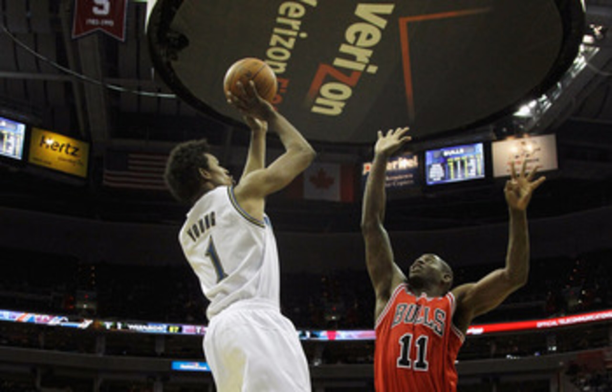 WASHINGTON, DC - FEBRUARY 28: Nick Young #1 of the Washington Wizards shoots over Ronnie Brewer #11 of the Chicago Bulls at the Verizon Center in Washington on February 28, 2011 in Washington, DC. NOTE TO USER: User expressly acknowledges and agrees that,