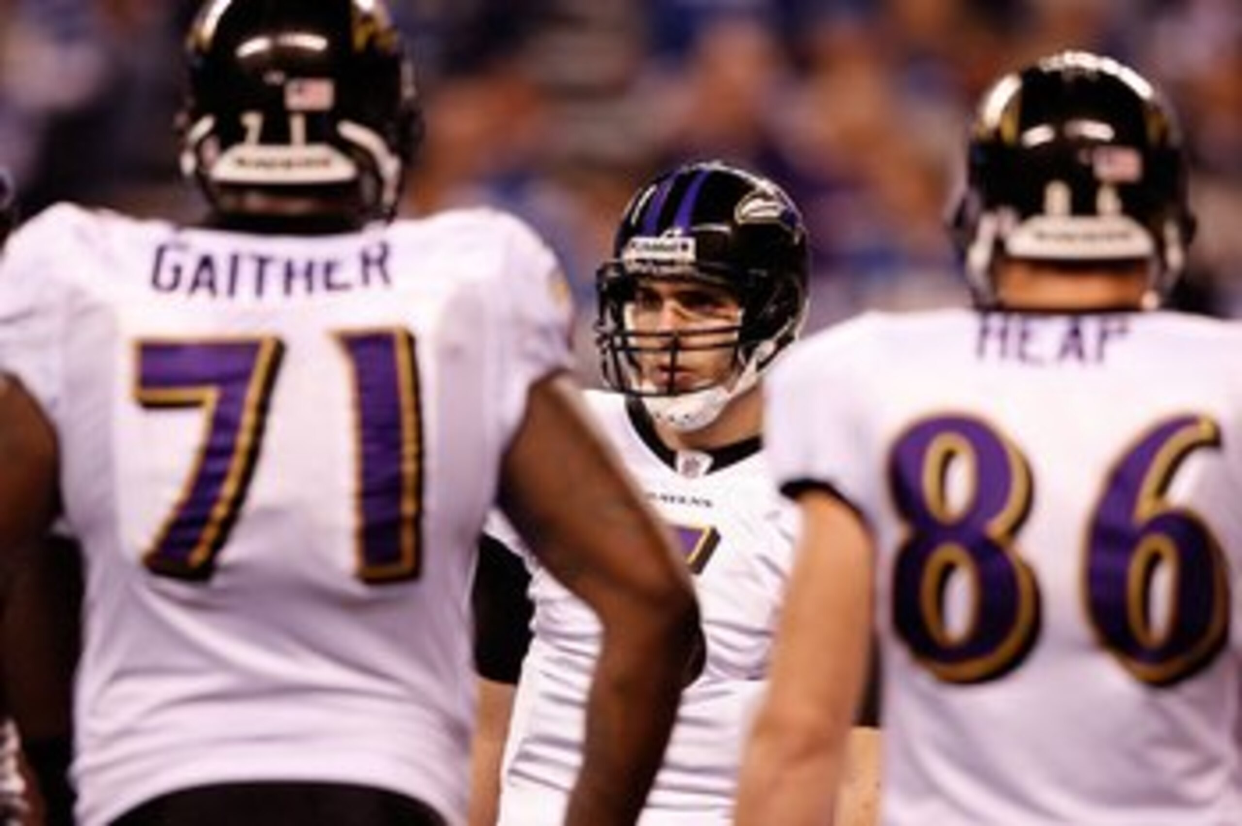 INDIANAPOLIS - JANUARY 16: Quarterback Joe Flacco #5 of the Baltimore Ravens huddles with teammates against the Indianapolis Colts in the AFC Divisional Playoff Game at Lucas Oli Stadium on January 16, 2010 in Indianapolis, Indiana. (Photo by Andy Lyons INDIANAPOLIS - JANUARY 16: Quarterback Joe Flacco #5 of the Baltimore Ravens huddles with teammates against the Indianapolis Colts in the AFC Divisional Playoff Game at Lucas Oli Stadium on January 16, 2010 in Indianapolis, Indiana. (Photo by Andy Lyons