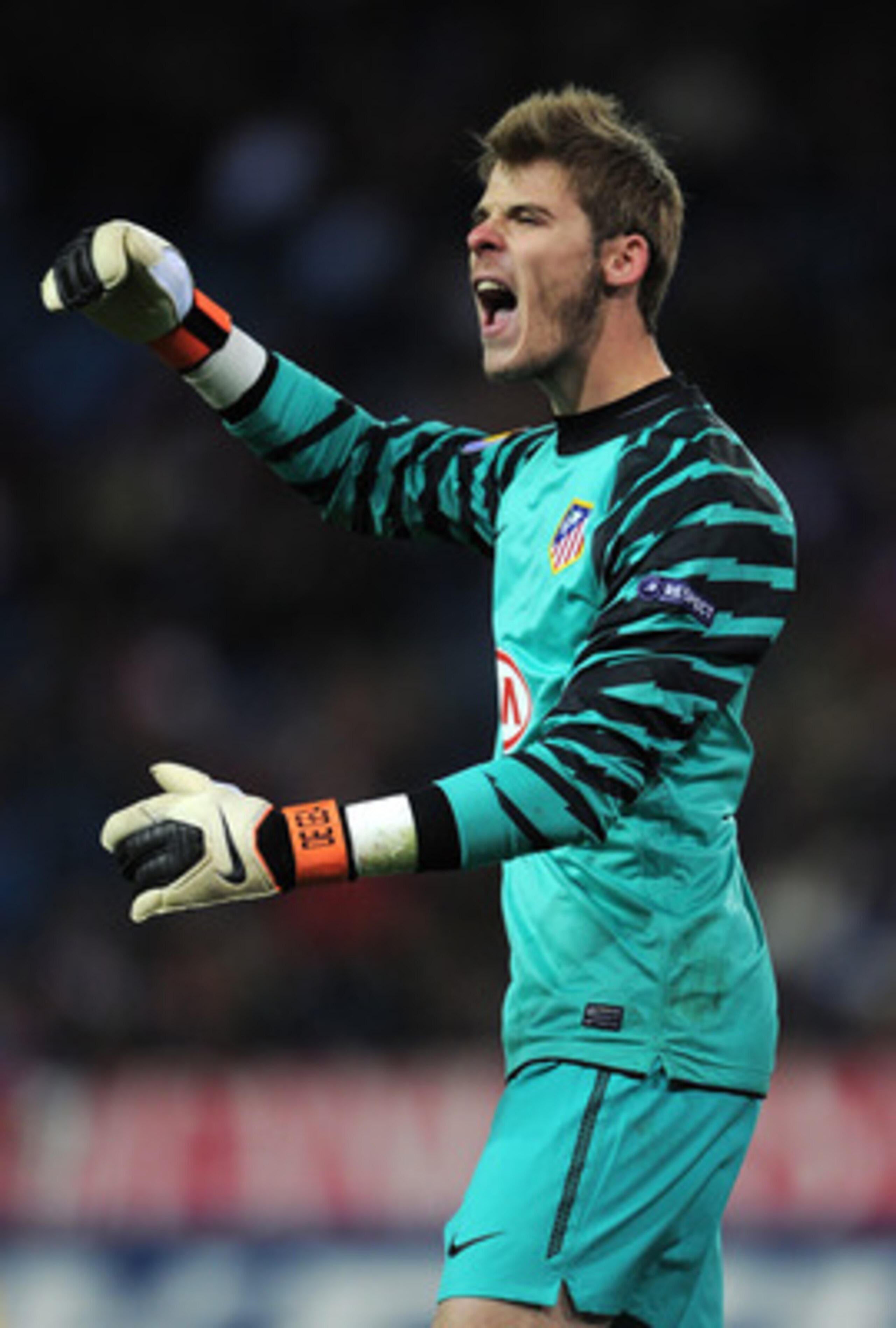MADRID, SPAIN - DECEMBER 01: Goalkeeper David de Gea of Atletico Madrid reacts during the Europea League match between Atletico Madrid and Aris Thessaloniki at the Vicente Calderon Stadium on December 1, 2010 in Madrid, Spain. (Photo by Jasper Juinen/Ge MADRID, SPAIN - DECEMBER 01: Goalkeeper David de Gea of Atletico Madrid reacts during the Europea League match between Atletico Madrid and Aris Thessaloniki at the Vicente Calderon Stadium on December 1, 2010 in Madrid, Spain. (Photo by Jasper Juinen/Ge