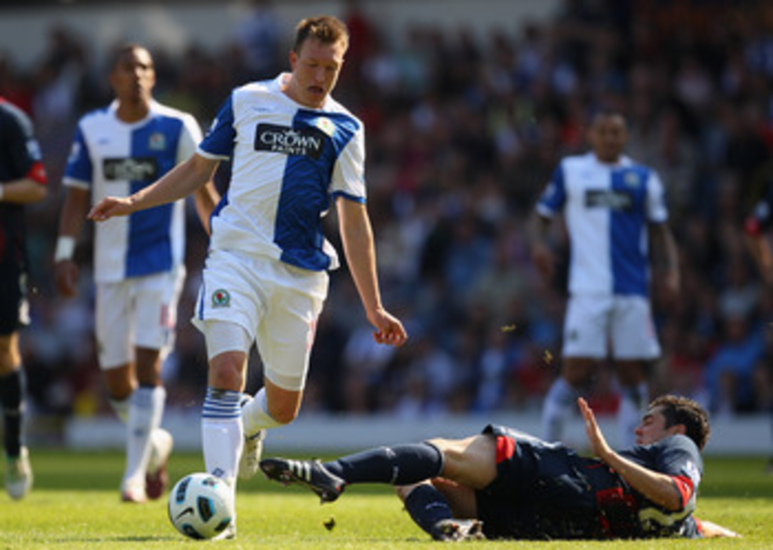 BLACKBURN, ENGLAND - APRIL 30: Phil Jones of Blackburn Rovers is tackled by Tamir Cohen of Bolton Wanderers during the Barclays Premier League match between Blackburn Rovers and Bolton Wanderers at Ewood Park on April 30, 2011 in Blackburn, England. (Ph BLACKBURN, ENGLAND - APRIL 30: Phil Jones of Blackburn Rovers is tackled by Tamir Cohen of Bolton Wanderers during the Barclays Premier League match between Blackburn Rovers and Bolton Wanderers at Ewood Park on April 30, 2011 in Blackburn, England. (Ph