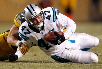 PITTSBURGH - DECEMBER 23:  Jeff King #47 of the Carolina Panthers is tackled after catching a pass during the game against the Pittsburgh Steelers on December 23, 2010 at Heinz Field in Pittsburgh, Pennsylvania.  (Photo by Jared Wickerham/Getty Images)