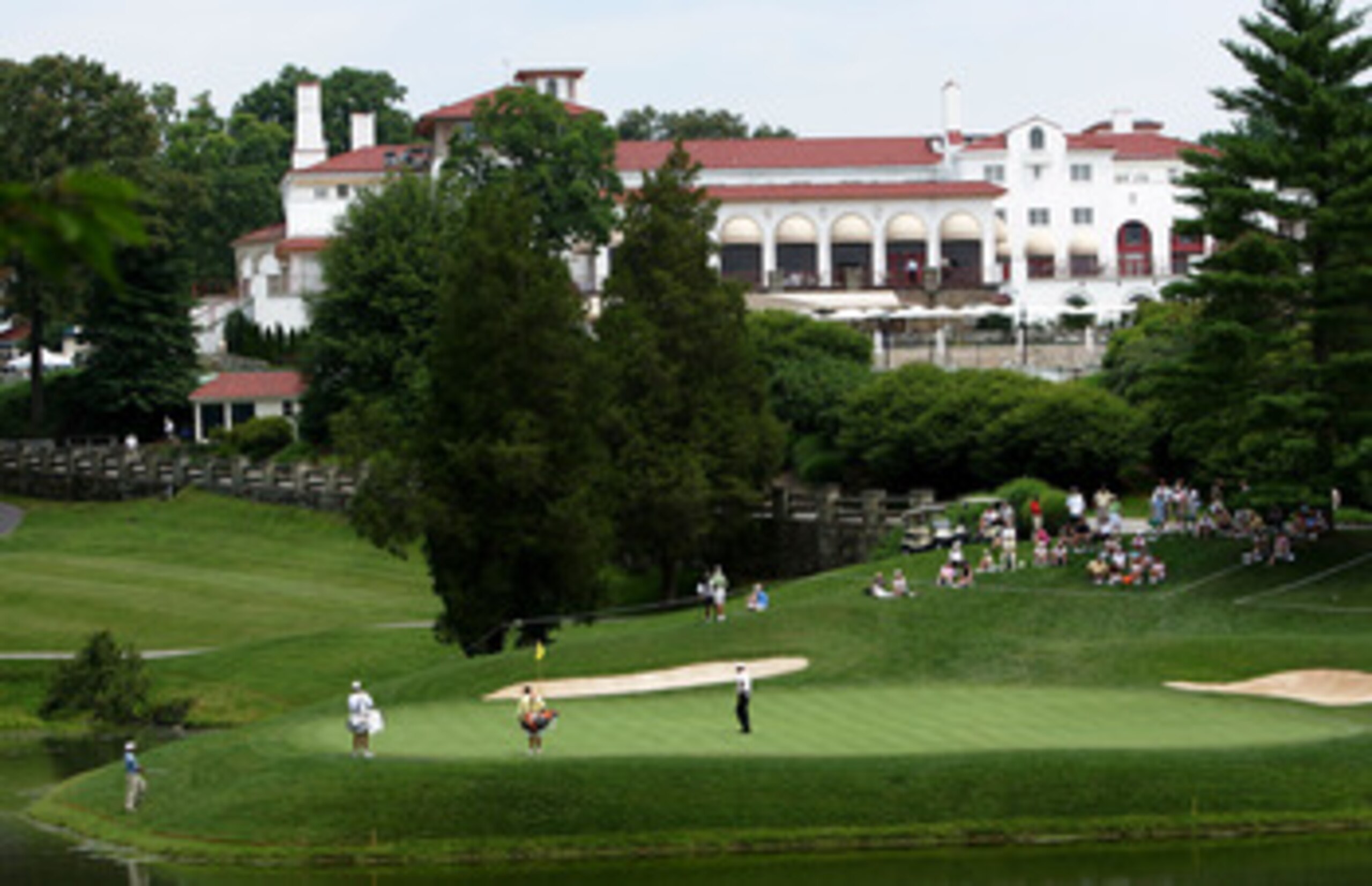 POTOMAC, MD - JUNE 28:  A general view as players putt on the 18th green of the Blue Course during British Open Championship Final Qualifying on June 26, 2004 at Congressional Country Club in Potomac, Maryland.  (Photo by Jamie Squire/Getty Images)