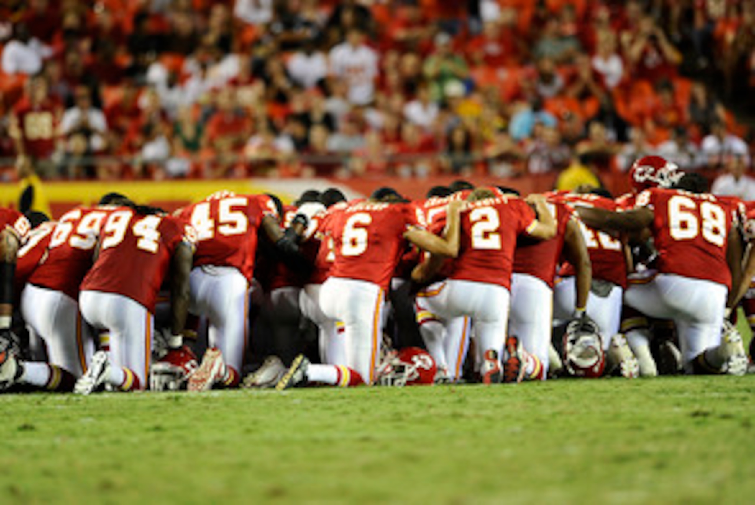 KANSAS CITY, MO - AUGUST 27: Players for the Kansas City Chiefs gather on the field to pray for Cameron Sheffield who suffered an injury during a preseason game against the Philadelphia Eagles at Arrowhead Stadium on August 27, 2010 in Kansas City, Missou KANSAS CITY, MO - AUGUST 27: Players for the Kansas City Chiefs gather on the field to pray for Cameron Sheffield who suffered an injury during a preseason game against the Philadelphia Eagles at Arrowhead Stadium on August 27, 2010 in Kansas City, Missou