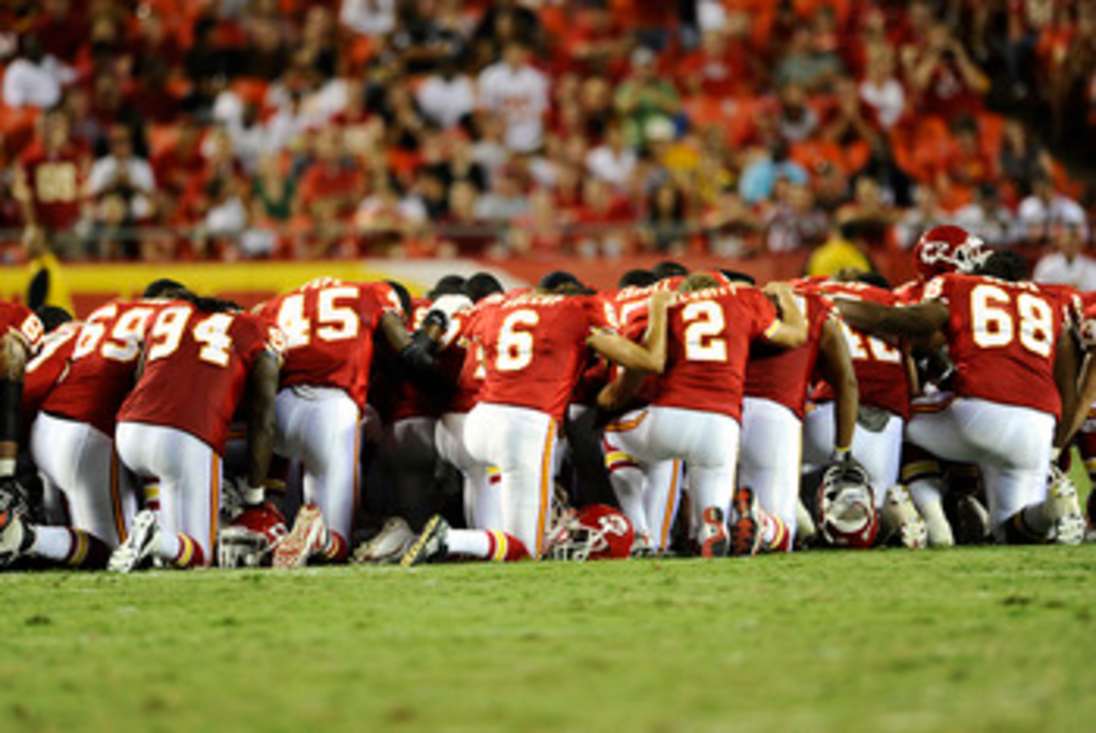 KANSAS CITY, MO - AUGUST 27: Players for the Kansas City Chiefs gather on the field to pray for Cameron Sheffield who suffered an injury during a preseason game against the Philadelphia Eagles at Arrowhead Stadium on August 27, 2010 in Kansas City, Missou