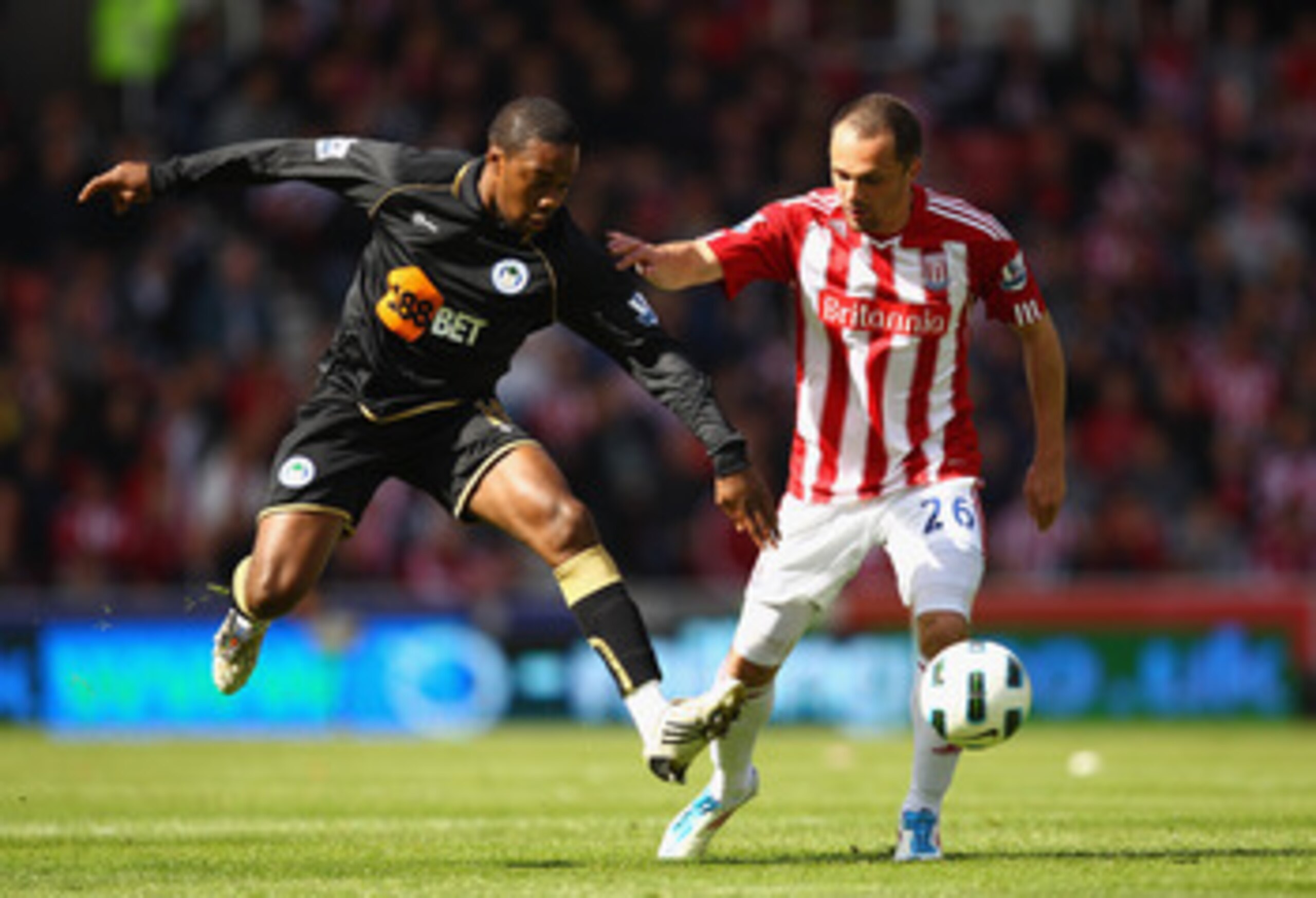 STOKE ON TRENT, ENGLAND - MAY 22: Charles N'Zogbia of Wigan battles for the ball with Matthew Etherington of Stoke during the Barclays Premier League match between Stoke City and Wigan Athletic at Britannia Stadium on May 22, 2011 in Stoke on Trent, Engla