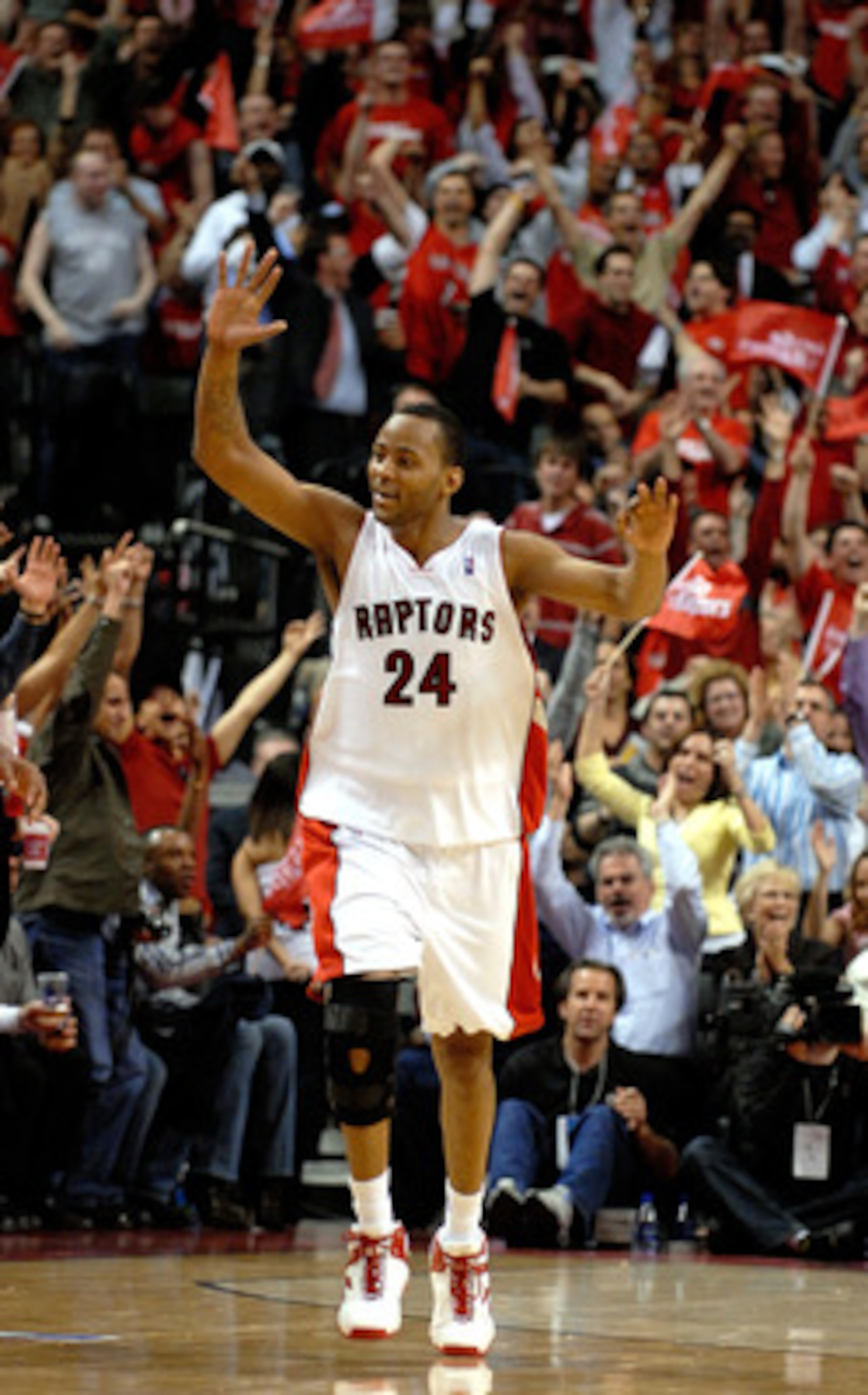 TORONTO- APRIL 24:  Morris Peterson #24 of the Toronto Raptors celebrates a basket against the New Jersey Nets in Game Two of the Eastern Conference Quarterfinals during the 2007 NBA Playoffs on April 24, 2007 at Air Canada Centre in Toronto, Ontario, Can