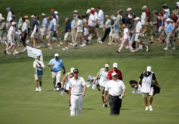 BETHESDA, MD - JULY 3: (L-R) Jeff Overton and Jeff Gore walk toward their balls on the 5th hole during the first round of the AT&T National at Congressional Country Club on July 3, 2008 in Bethesda, Maryland. (Photo by Hunter Martin/Getty Images)