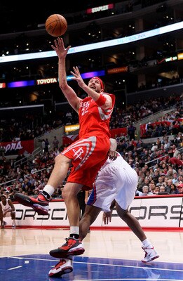 LOS ANGELES, CA - DECEMBER 22:  Brad Miller #52 of the Houston Rockets makes an off balance but scores a basket against the Los Angeles Clippers at Staples Center on December 22, 2010 in Los Angeles, California.  The Rockets won 97-92. NOTE TO USER: User