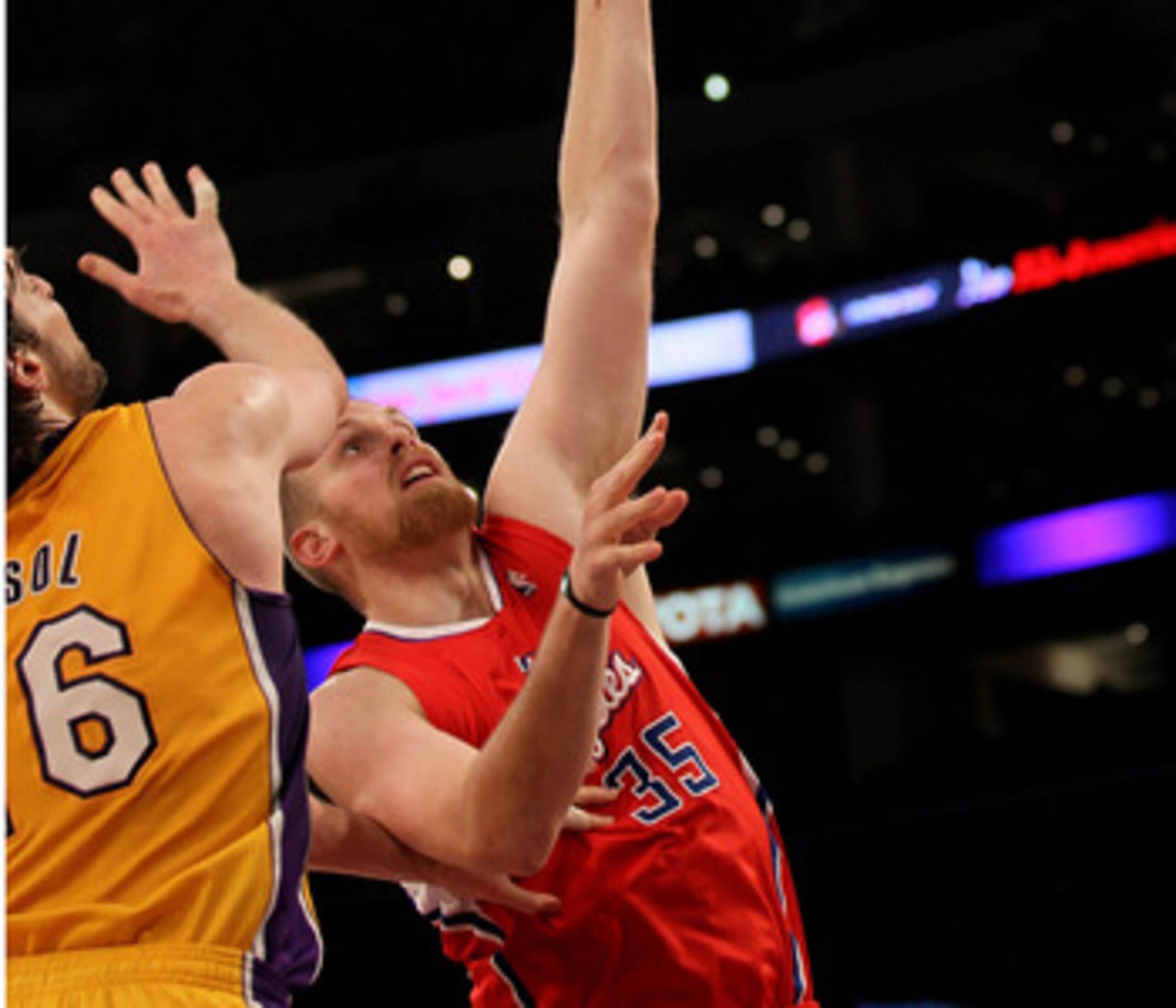 LOS ANGELES, CA - FEBRUARY 25:  Chris Kaman #35 of the Los Angeles Clippers shoots over Pau Gasol #16 of the Los Angeles Lakers at Staples Center on February 25, 2011 in Los Angeles, California. The Lakers won 108-95.  NOTE TO USER: User expressly acknowl