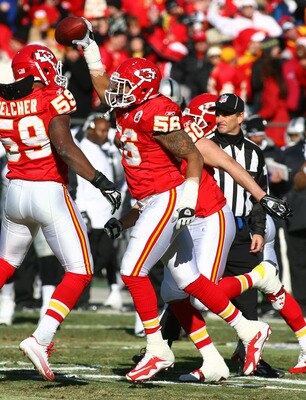 KANSAS CITY, MO - JANUARY 02:  Linebacker Derrick Johnson #56 of the Kansas City Chiefs celebrates after recovering a fumble in a game against the Oakland Raiders at Arrowhead Stadium on January 2, 2011 in Kansas City, Missouri.  (Photo by Tim Umphrey/Get