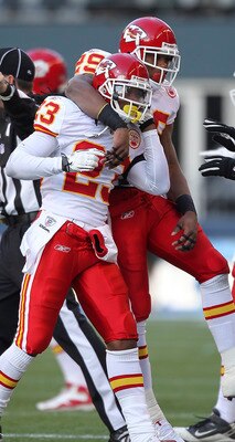 SEATTLE - NOVEMBER 28:  Safety Kendrick Lewis #23 of the Kansas City Chiefs is congratulated by Eric Berry #29 after intercepting a pass against the Seattle Seahawks at Qwest Field on November 28, 2010 in Seattle, Washington. The Chiefs defeated the Seaha