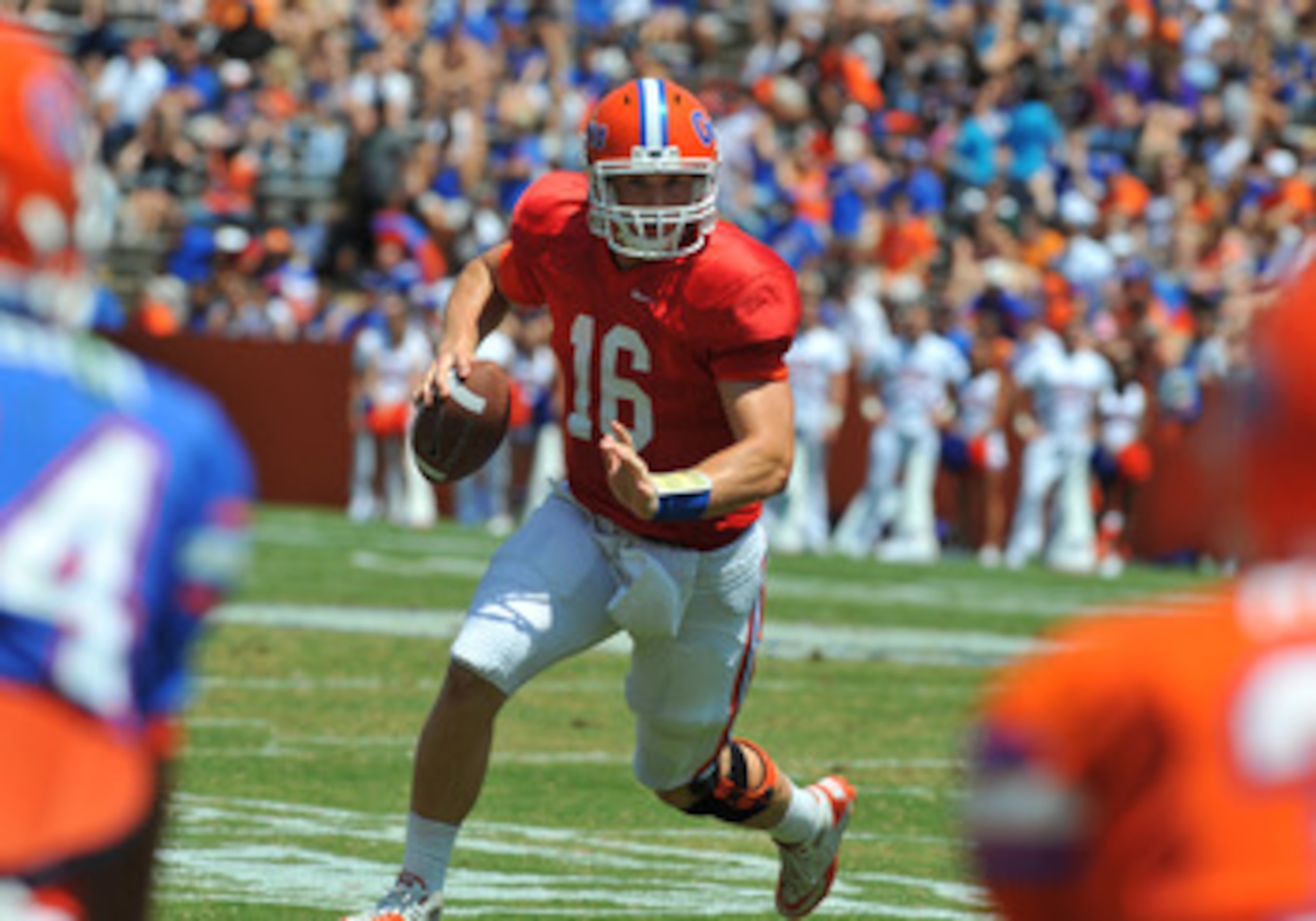 GAINESVILLE, FL - APRIL 9:  Quarterback Jeff Driskel #16 of the Florida Gators runs upfield during the Orange and Blue spring football game April 9, 2011 at Ben Hill Griffin Stadium in Gainesville, Florida.  (Photo by Al Messerschmidt/Getty Images)