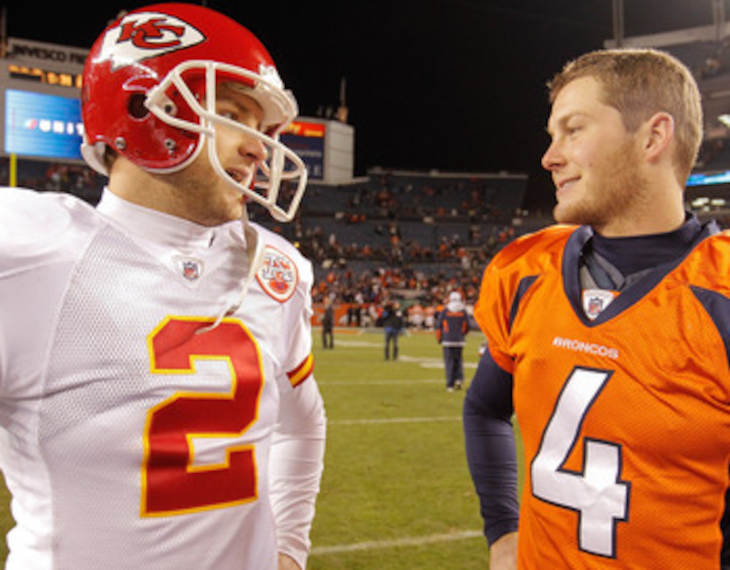 DENVER - NOVEMBER 14: Brothers punter Dustin Colquitt #2 of the Kansas City Chiefs punter Britton Colquitt #4 of the Denver Broncos talk following the Broncos 49-29 win at INVESCO Field at Mile High on November 14, 2010 in Denver, Colorado. (Photo by Jus DENVER - NOVEMBER 14: Brothers punter Dustin Colquitt #2 of the Kansas City Chiefs punter Britton Colquitt #4 of the Denver Broncos talk following the Broncos 49-29 win at INVESCO Field at Mile High on November 14, 2010 in Denver, Colorado. (Photo by Jus