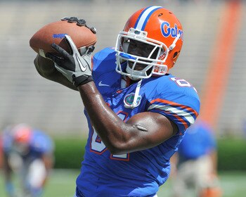GAINESVILLE, FL - APRIL 9:  Tight end A. C. Leonard #81 of the Florida Gators grabs a warmup pass before the Orange and Blue spring football game April 9, 2011 at Ben Hill Griffin Stadium in Gainesville, Florida.  (Photo by Al Messerschmidt/Getty Images)