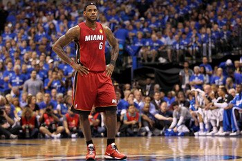 DALLAS, TX - JUNE 07:  LeBron James #6 of the Miami Heat looks on against the Dallas Mavericks in Game Four of the 2011 NBA Finals at American Airlines Center on June 7, 2011 in Dallas, Texas. NOTE TO USER: User expressly acknowledges and agrees that, by