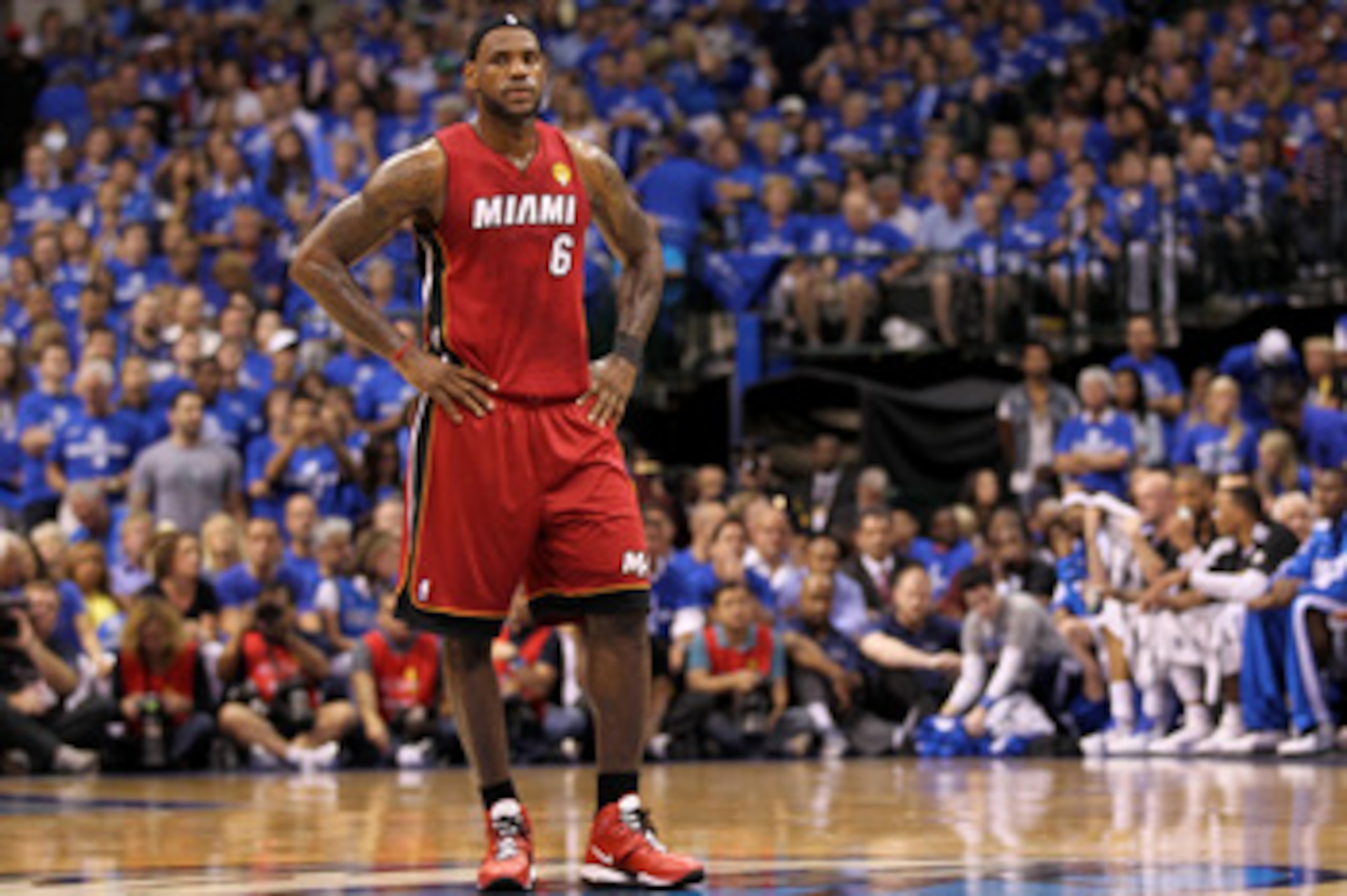 DALLAS, TX - JUNE 07:  LeBron James #6 of the Miami Heat looks on against the Dallas Mavericks in Game Four of the 2011 NBA Finals at American Airlines Center on June 7, 2011 in Dallas, Texas. NOTE TO USER: User expressly acknowledges and agrees that, by