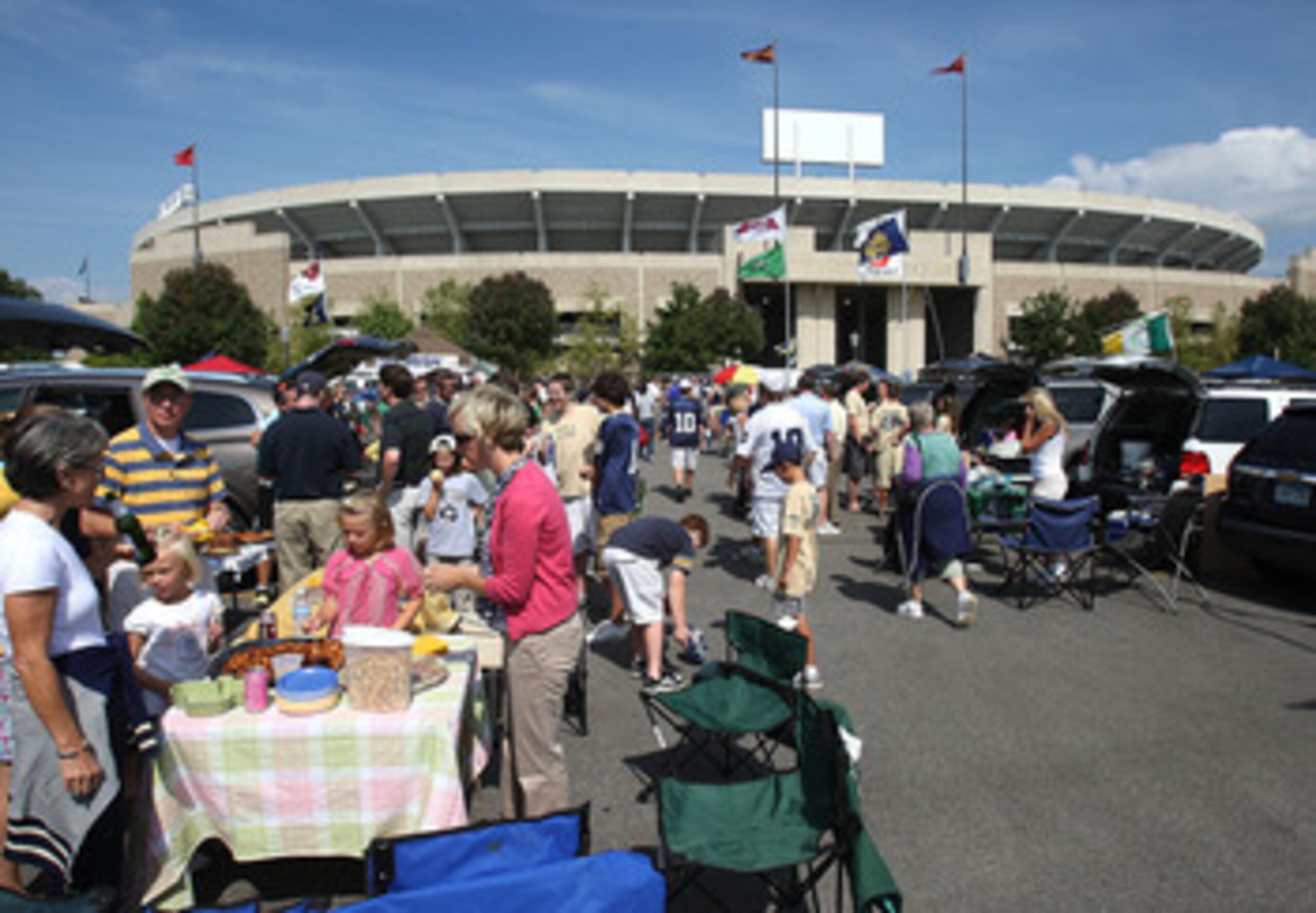 SOUTH BEND, IN - SETPEMBER 19: Fans tailgate in the parking lot before a game between the Notre Dame Fighting Irish and the Michigan State Spartans on September 19, 2009 at Notre Dame Stadium in South Bend, Indiana. (Photo by Jonathan Daniel/Getty Images) SOUTH BEND, IN - SETPEMBER 19: Fans tailgate in the parking lot before a game between the Notre Dame Fighting Irish and the Michigan State Spartans on September 19, 2009 at Notre Dame Stadium in South Bend, Indiana. (Photo by Jonathan Daniel/Getty Images)