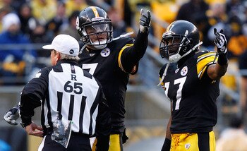 PITTSBURGH - DECEMBER 12:  Ben Roethlisberger #7 and Mike Wallace #17 of the Pittsburgh Steelers argue with the referee about a possible penalty during the game against the Cincinnati Bengals on December 12, 2010 at Heinz Field in Pittsburgh, Pennsylvania