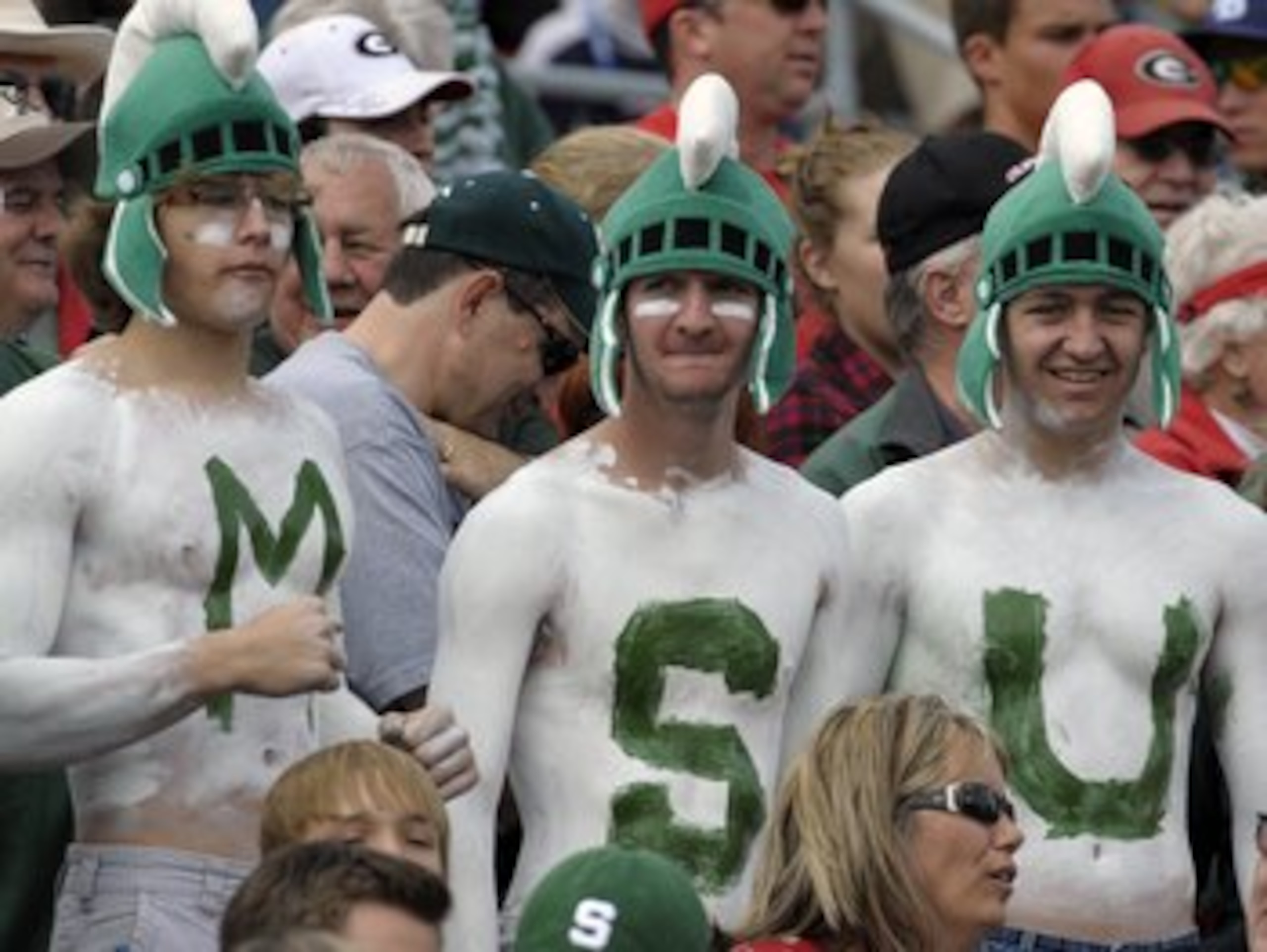 ORLANDO, FL - JANUARY 1: Fans of the Michigan State Spartans cheer play against the Georgia Bulldogs at the 2009 Capital One Bowl at the Citrus Bowl on January 1, 2009 in Orlando, Florida. (Photo by Al Messerschmidt/Getty Images) ORLANDO, FL - JANUARY 1: Fans of the Michigan State Spartans cheer play against the Georgia Bulldogs at the 2009 Capital One Bowl at the Citrus Bowl on January 1, 2009 in Orlando, Florida. (Photo by Al Messerschmidt/Getty Images)