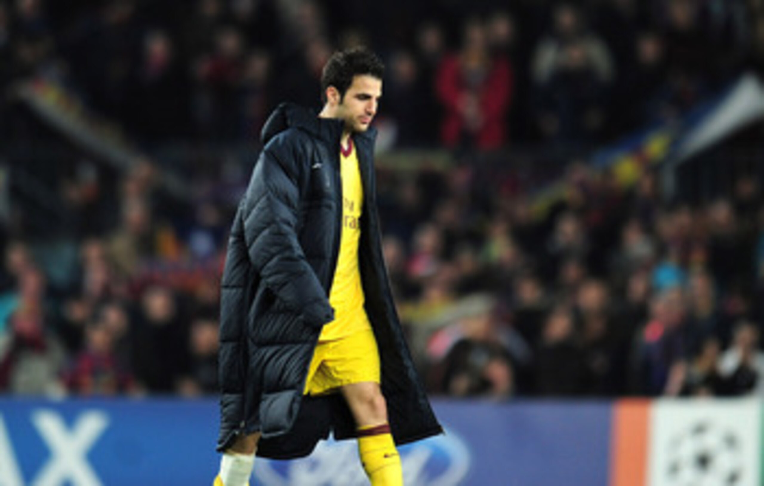 BARCELONA, SPAIN - MARCH 08:  Cesc Fabregas of Arsenal leaves the field at the end of the UEFA Champions League round of 16 second leg match between Barcelona and Arsenal at the Nou Camp Stadium on March 8, 2011 in Barcelona, Spain.  (Photo by Shaun Botte
