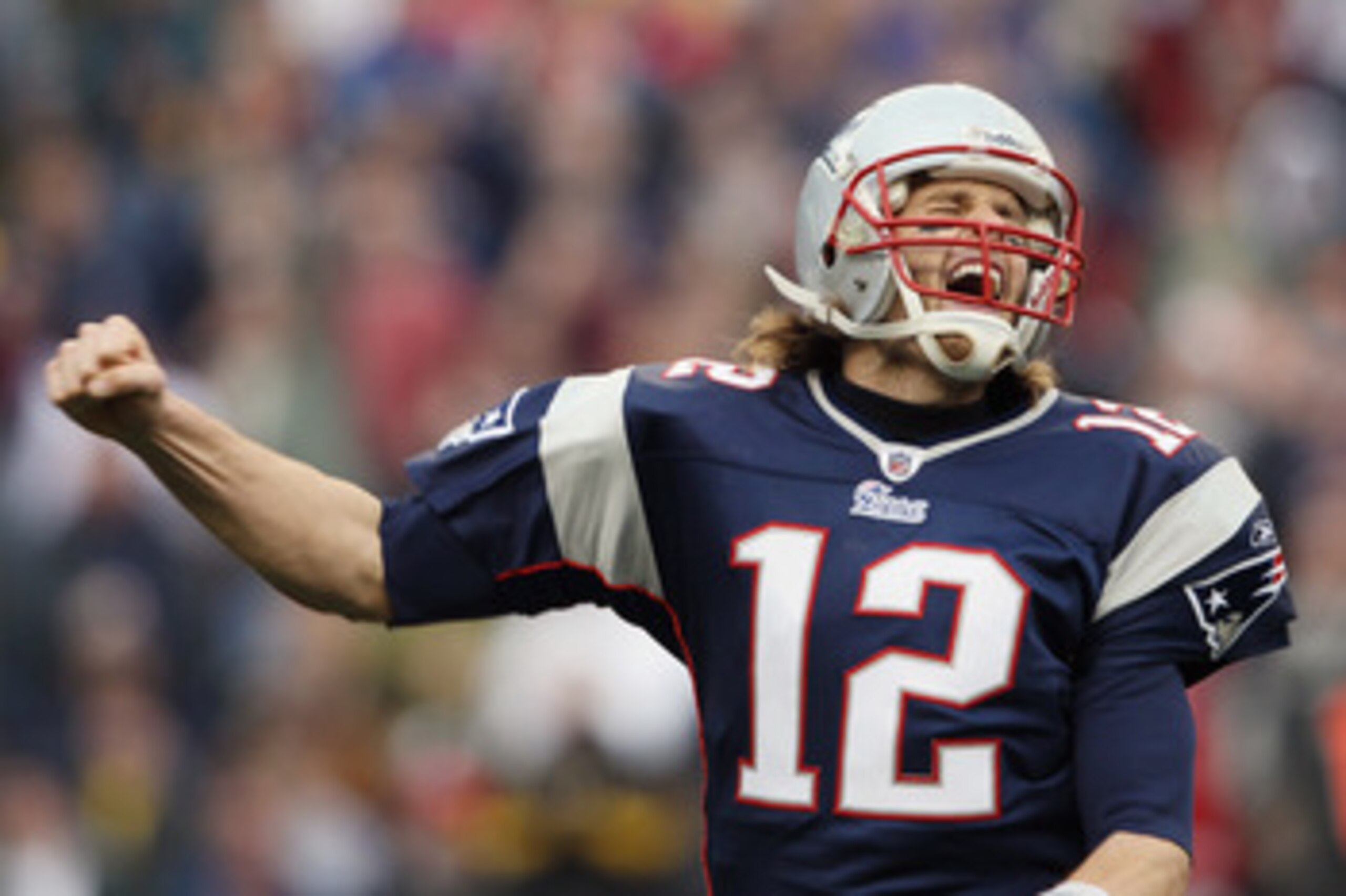 FOXBORO, MA - JANUARY 02:  Tom Brady #12 of the New England Patriots celebrates a touchdown by teammate BenJarvis Green-Ellis in the first quarter against the Miami Dolphins on January 2, 2011 at Gillette Stadium in Foxboro, Massachusetts.  (Photo by Elsa
