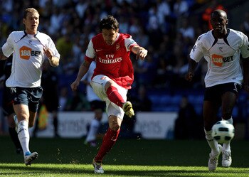 BOLTON, ENGLAND - APRIL 24: Cesc Fabregas of Arsenal shoots at goal during the Barclays Premier League match between Bolton Wanderers and Arsenal at the Reebok Stadium on April 24, 2011 in Bolton, England. (Photo by Michael Steele/Getty Images) BOLTON, ENGLAND - APRIL 24: Cesc Fabregas of Arsenal shoots at goal during the Barclays Premier League match between Bolton Wanderers and Arsenal at the Reebok Stadium on April 24, 2011 in Bolton, England. (Photo by Michael Steele/Getty Images)