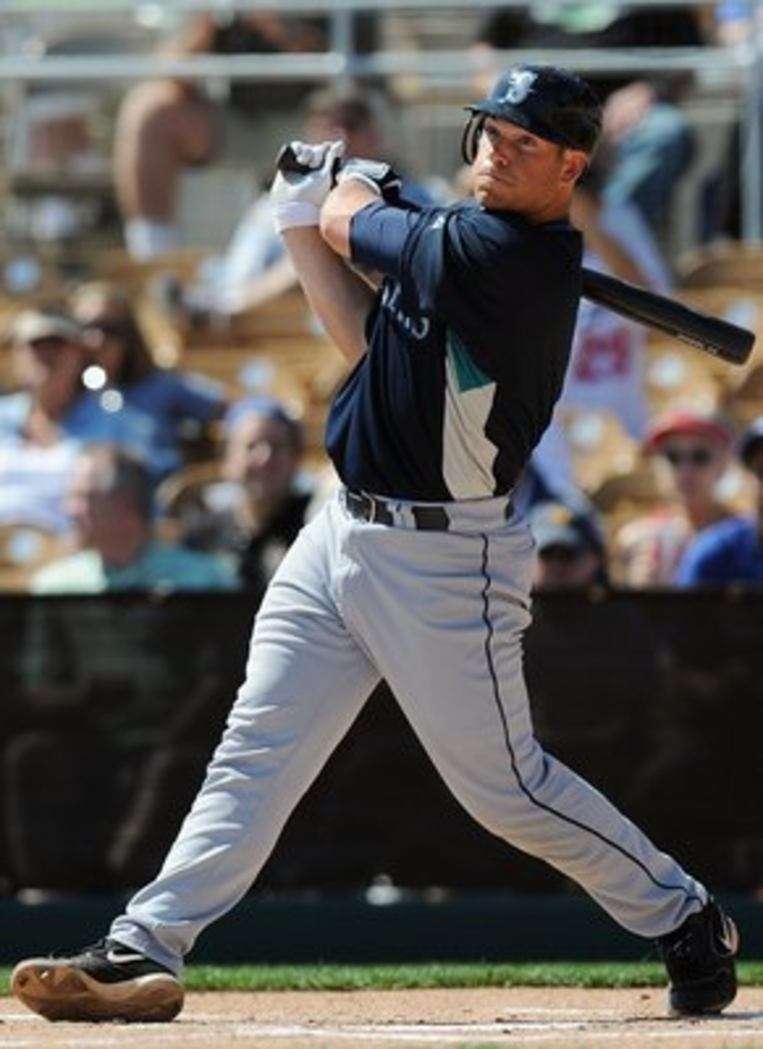 GLENDALE, AZ - MARCH 07:   Jeff Clement #9 of the Seattle Mariners bats during a Spring Training game against the Los Angeles Dodgers at Camelback Ranch on March 7, 2009 in Glendale, Arizona.  (Photo by Lisa Blumenfeld/Getty Images)