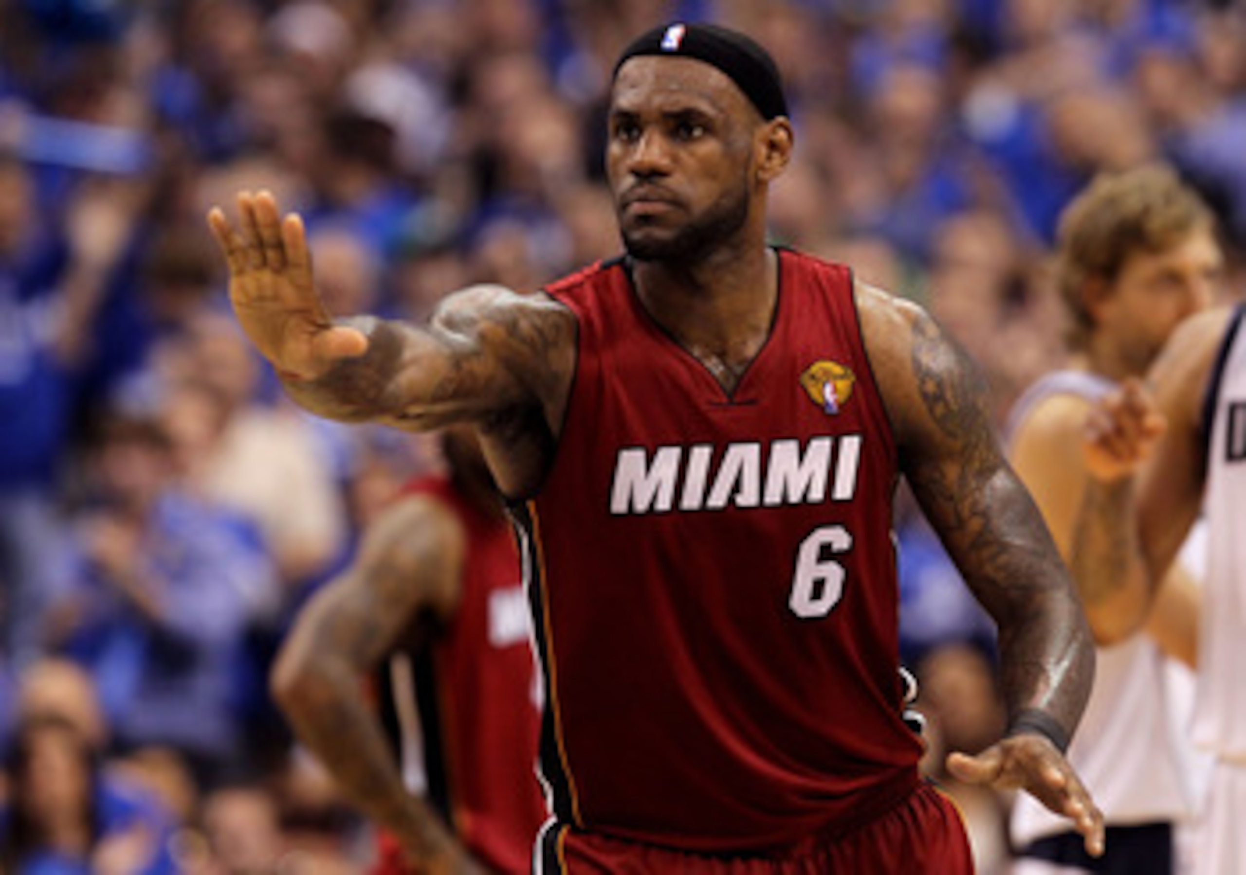 DALLAS, TX - JUNE 07:  LeBron James #6 of the Miami Heat gestures on court in the fourth quarter against the Dallas Mavericks in Game Four of the 2011 NBA Finals at American Airlines Center on June 7, 2011 in Dallas, Texas. NOTE TO USER: User expressly ac