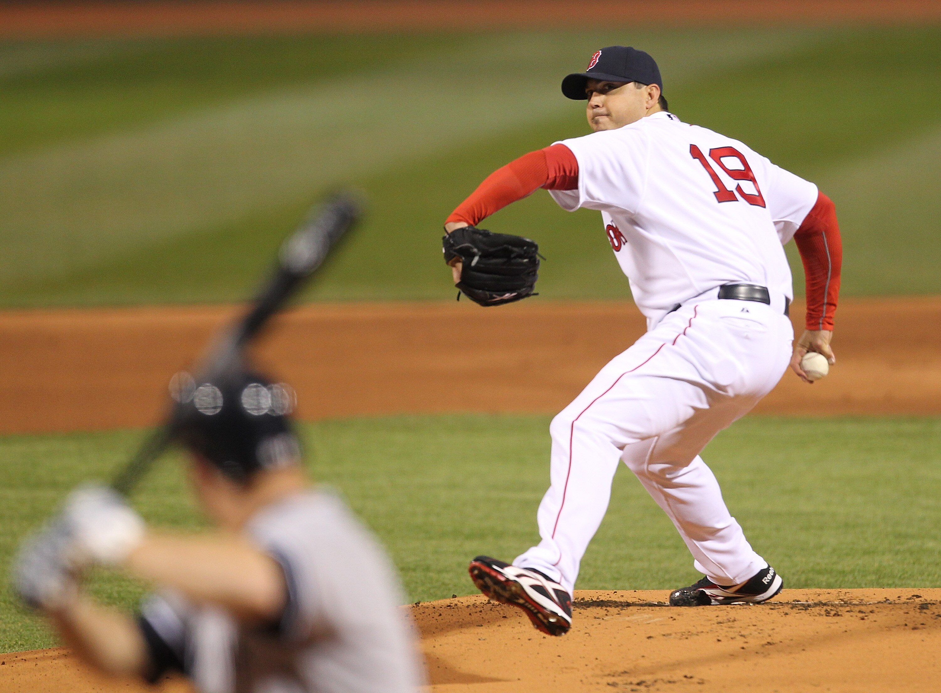 BOSTON, MA - APRIL 10: Josh Beckett #19 of the Boston Red Sox throws against the New York Yankees at Fenway Park April 10, 2011 in Boston, Massachusetts. (Photo by Jim Rogash/Getty Images) BOSTON, MA - APRIL 10: Josh Beckett #19 of the Boston Red Sox throws against the New York Yankees at Fenway Park April 10, 2011 in Boston, Massachusetts. (Photo by Jim Rogash/Getty Images)