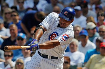 CHICAGO - APRIL 15: Starting pitcher Carlos Zambrano of the Chicago Cubs, wearing a number 42 jersey in honor of Jackie Robinson, swings at the ball against the Milwaukee Brewers at Wrigley Field on April 15, 2010 in Chicago, Illinois. The Brewers defeate