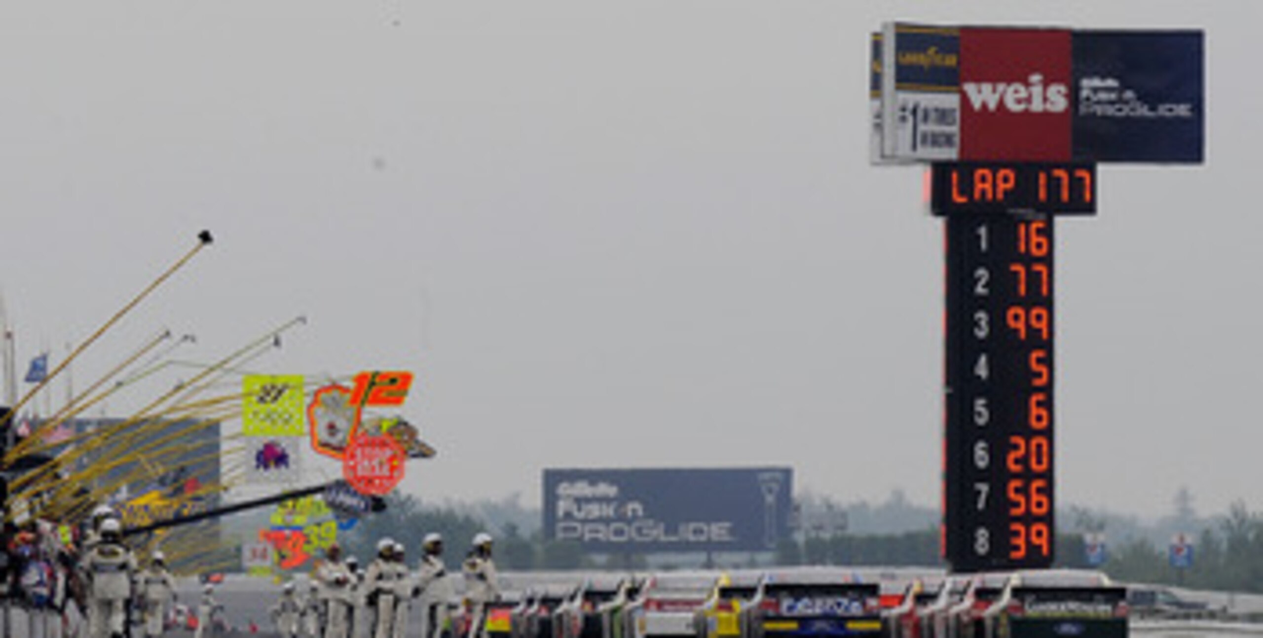 LONG POND, PA - AUGUST 01:  The field prepares to leave pit road after a red flag delay during the NASCAR Sprint Cup Series Sunoco Red Cross Pennsylvania 500 at Pocono Raceway on August 1, 2010 in Long Pond, Pennsylvania.  (Photo by Rusty Jarrett/Getty Im