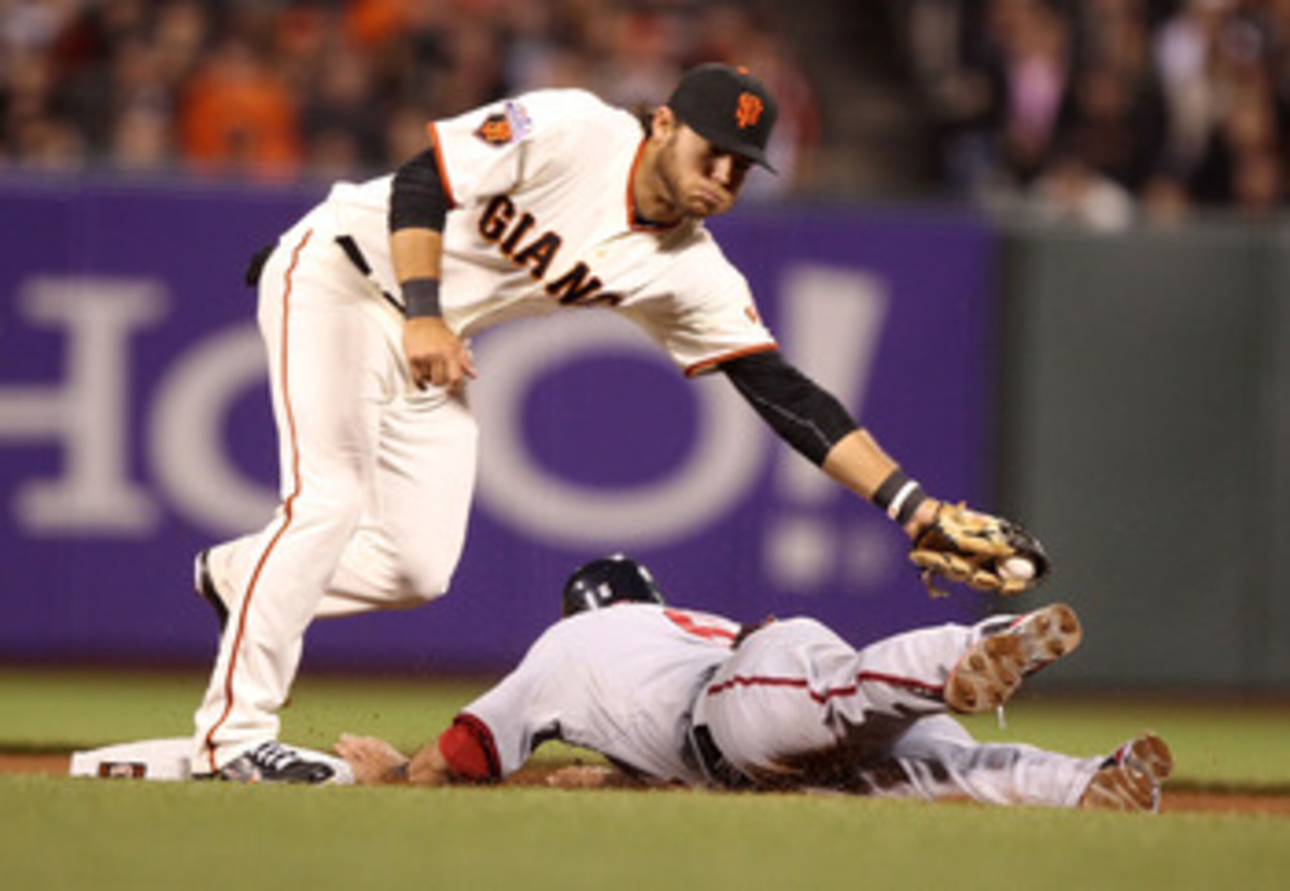 ST. LOUIS, MO - MAY 30:  Brandon Crawford #35 of the San Francisco Giants fields a line drive against the St. Louis Cardinals at Busch Stadium on May 30, 2011 in St. Louis, Missouri.  (Photo by Dilip Vishwanat/Getty Images)