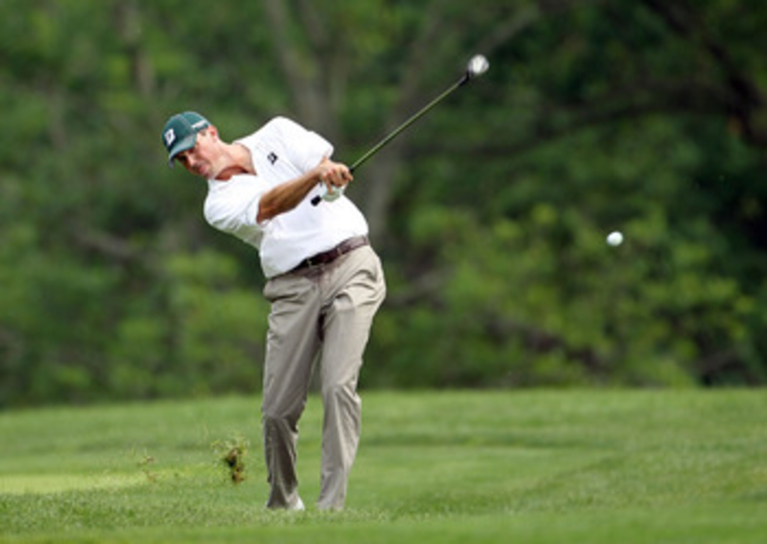 DUBLIN, OH - JUNE 05:  Matt Kuchar hits his second shot on the par 4 10th hole during the final round of the Memorial Tournament presented by Nationwide Insurance at Muirfield Village Golf Club on June 5, 2011 in Dublin, Ohio.  (Photo by Andy Lyons/Getty