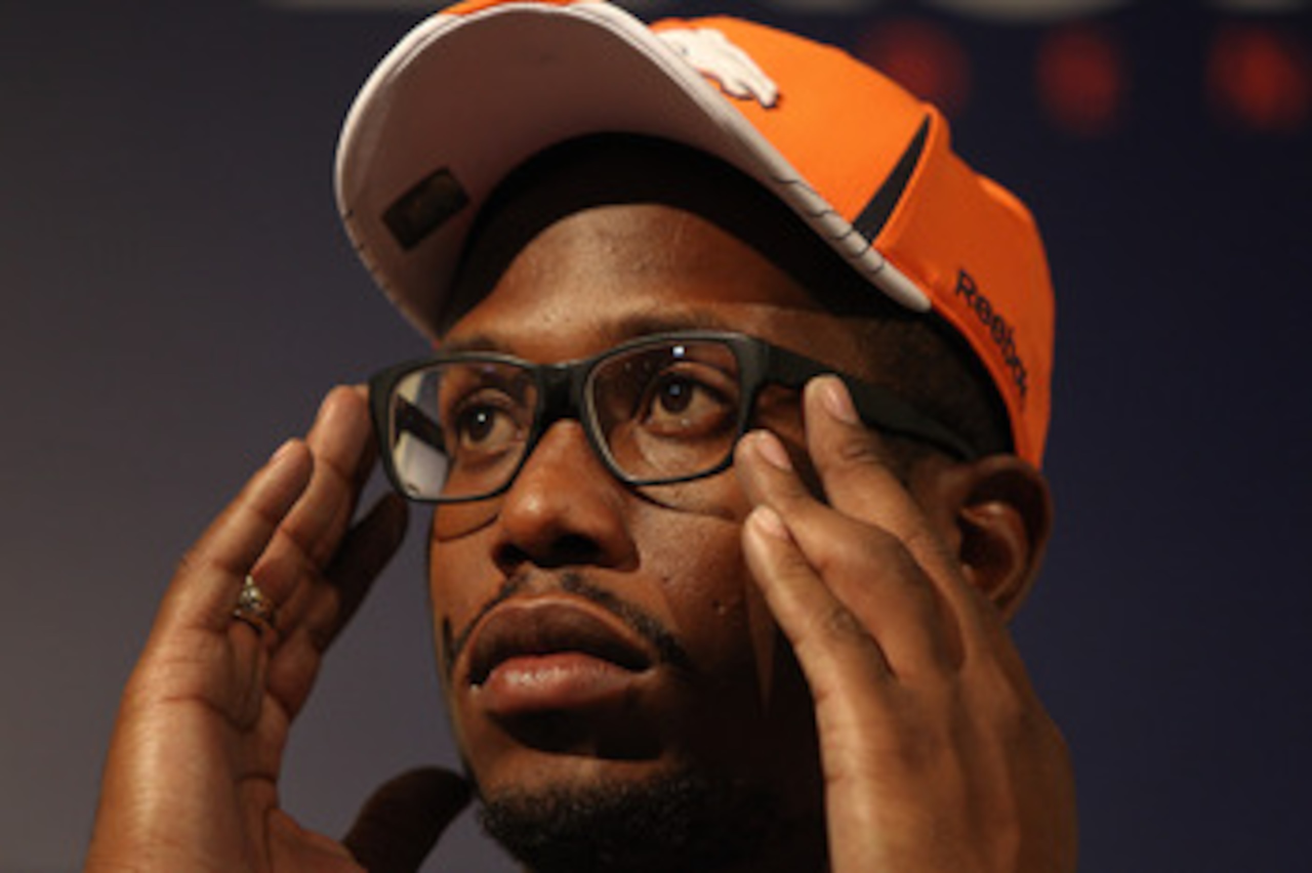 ENGLEWOOD, CO - APRIL 29:  Von Miller of the Denver Broncos adjusts his glasses while speaking to the media at Dove Valley on April 29, 2011 in Englewood, Colorado. Miller, a projected outside linebacker in head coach John Fox's new 4-3 scheme, was select