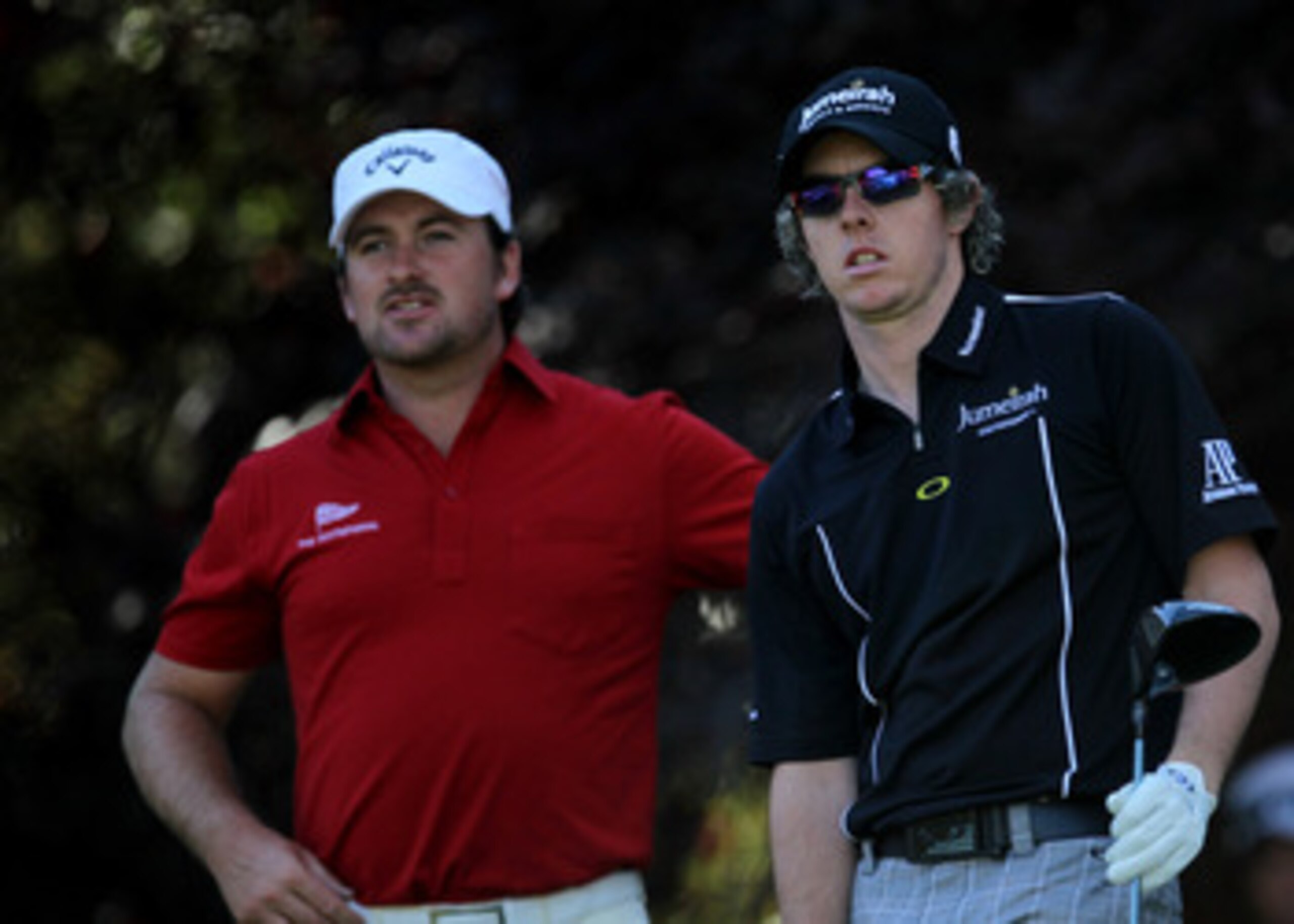 THOUSAND OAKS, CA - DECEMBER 02:  Rory McIlroy (R) and Graeme McDowel, bothl of Northern Ireland survey their tee shots on the second hole during the Chevron World Challenge at Sherwood Country Club on December 2, 2010 in Thousand Oaks, California.  (Phot
