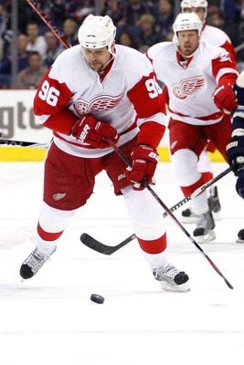 COLUMBUS, OH - JANUARY 14:  Tomas Holmstrom #96 of the Detroit Red Wings skates the puck up ice during a game against the Columbus Blue Jackets on January 14, 2011 at Nationwide Arena in Columbus, Ohio. (Photo by John Grieshop/Getty Images)