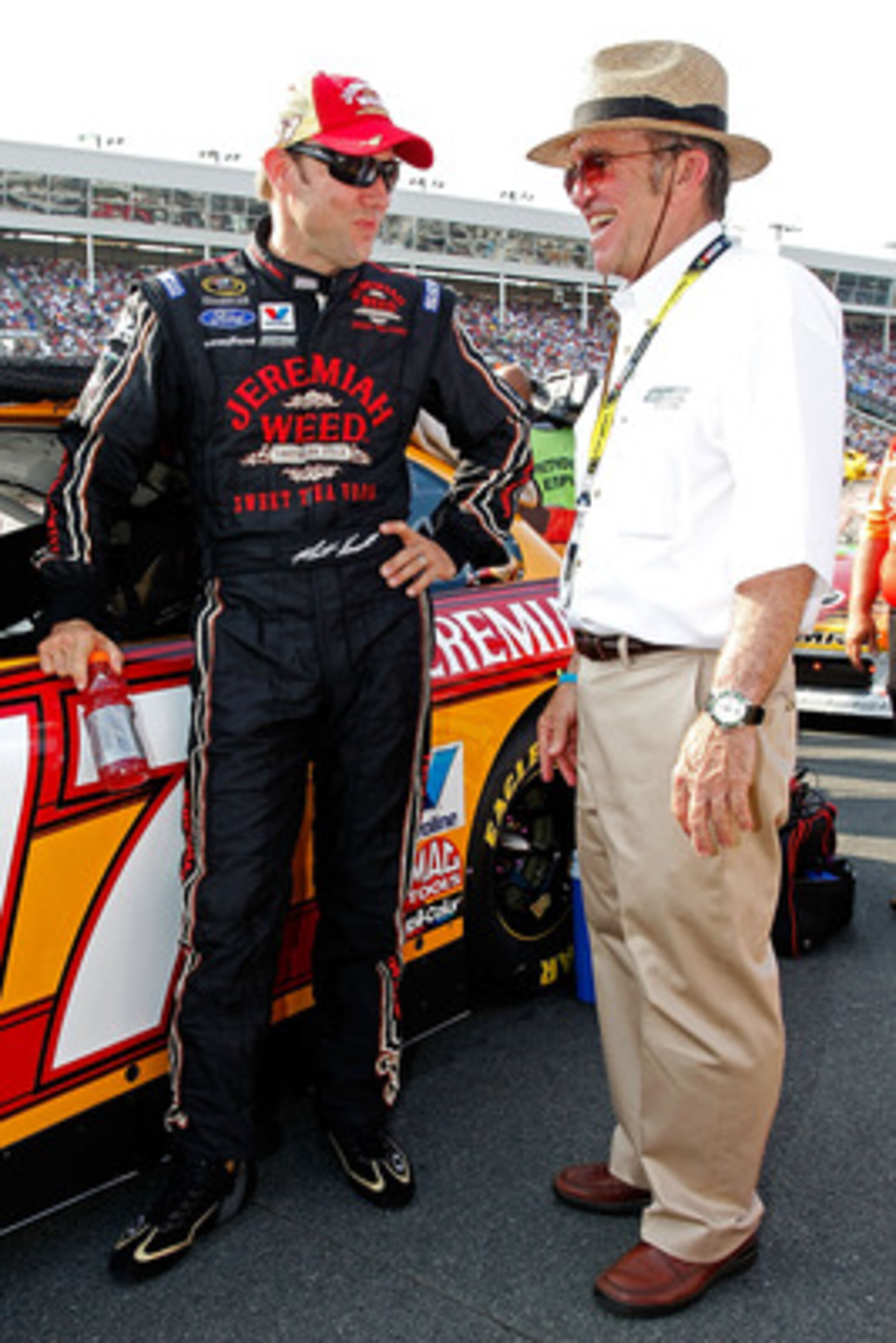 CONCORD, NC - MAY 29: Matt Kenseth (L), driver of the #17 Jeremiah Weed Southern Style  Ford, talks with car owner Jack Roush (R) on the grid prior to the NASCAR Sprint Cup Series Coca-Cola 600 at Charlotte Motor Speedway on May 29, 2011 in Concord, North
